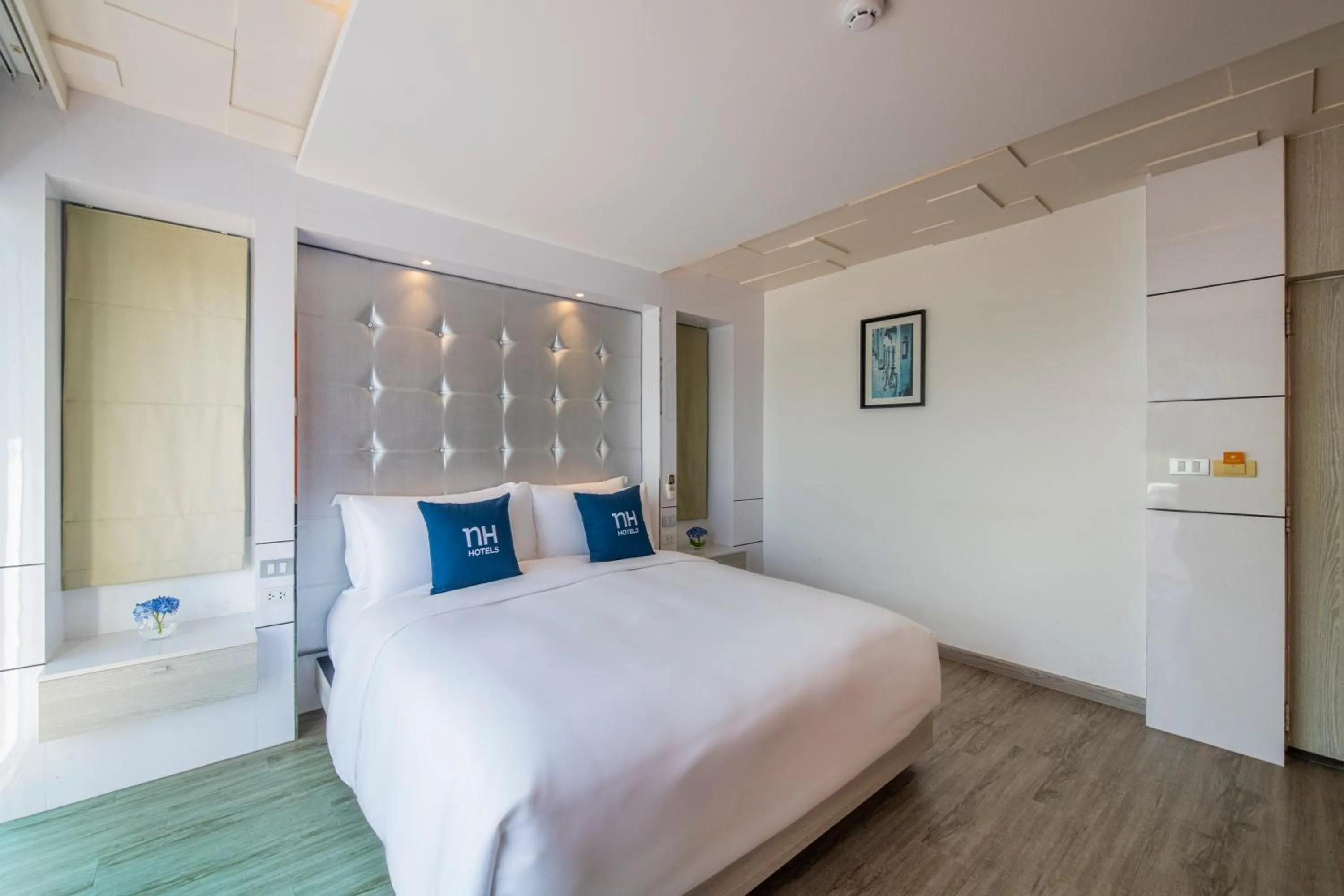 Bed in NH Boat Lagoon Phuket Resort