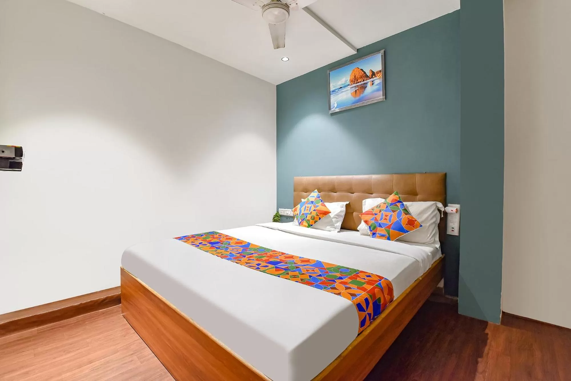 Bed in FabHotel Nidhivan, Udhna Junction