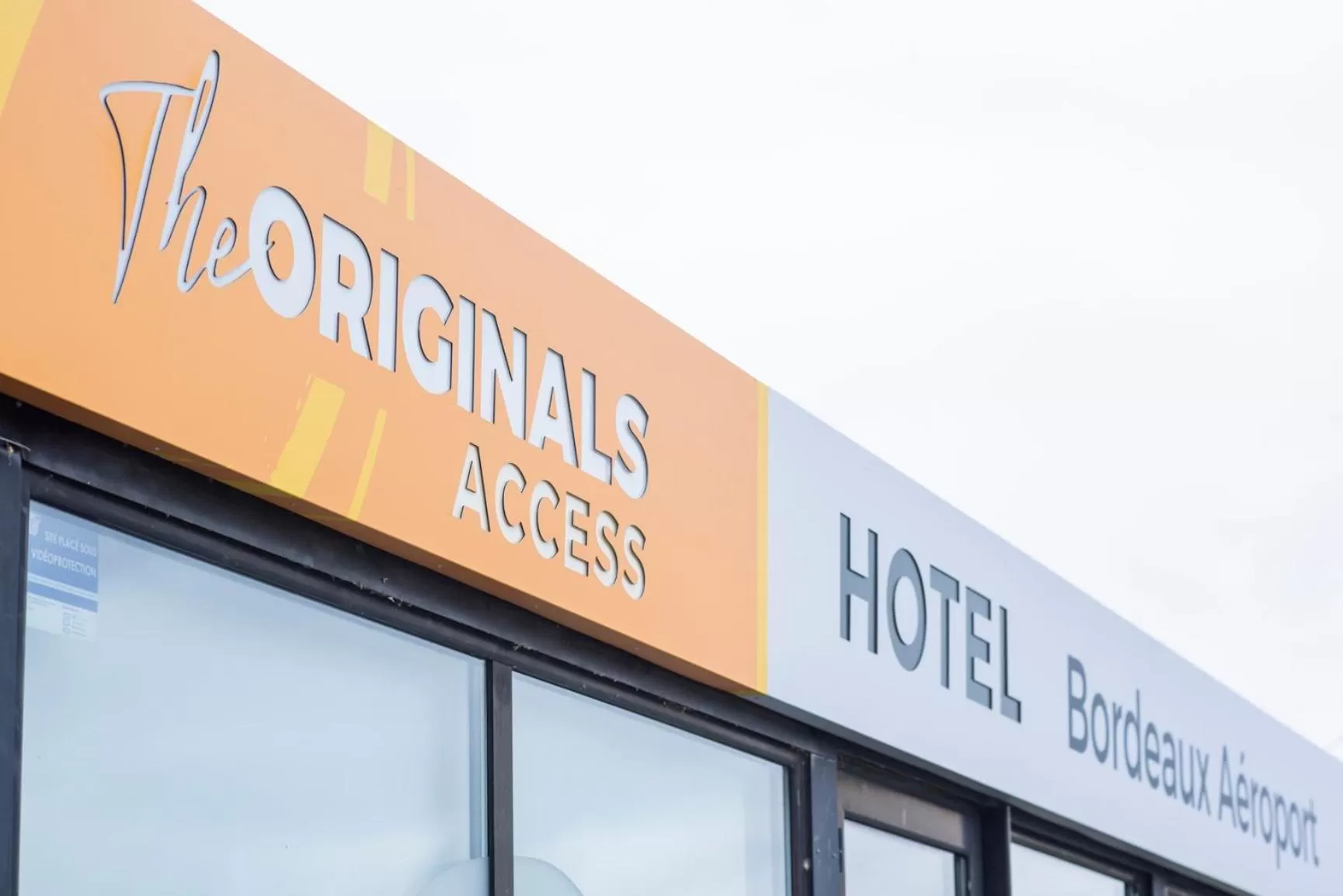 Property logo or sign in The Originals Access Hôtel Bordeaux Aéroport