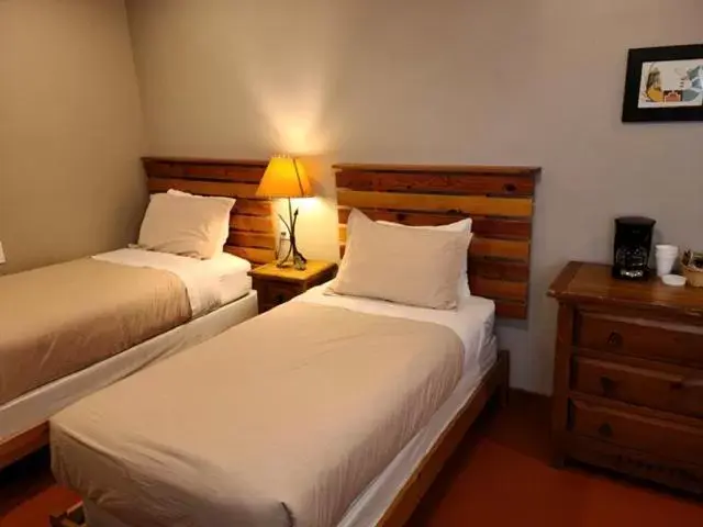 Bed in Lee's Ferry Lodge at Vermilion Cliffs