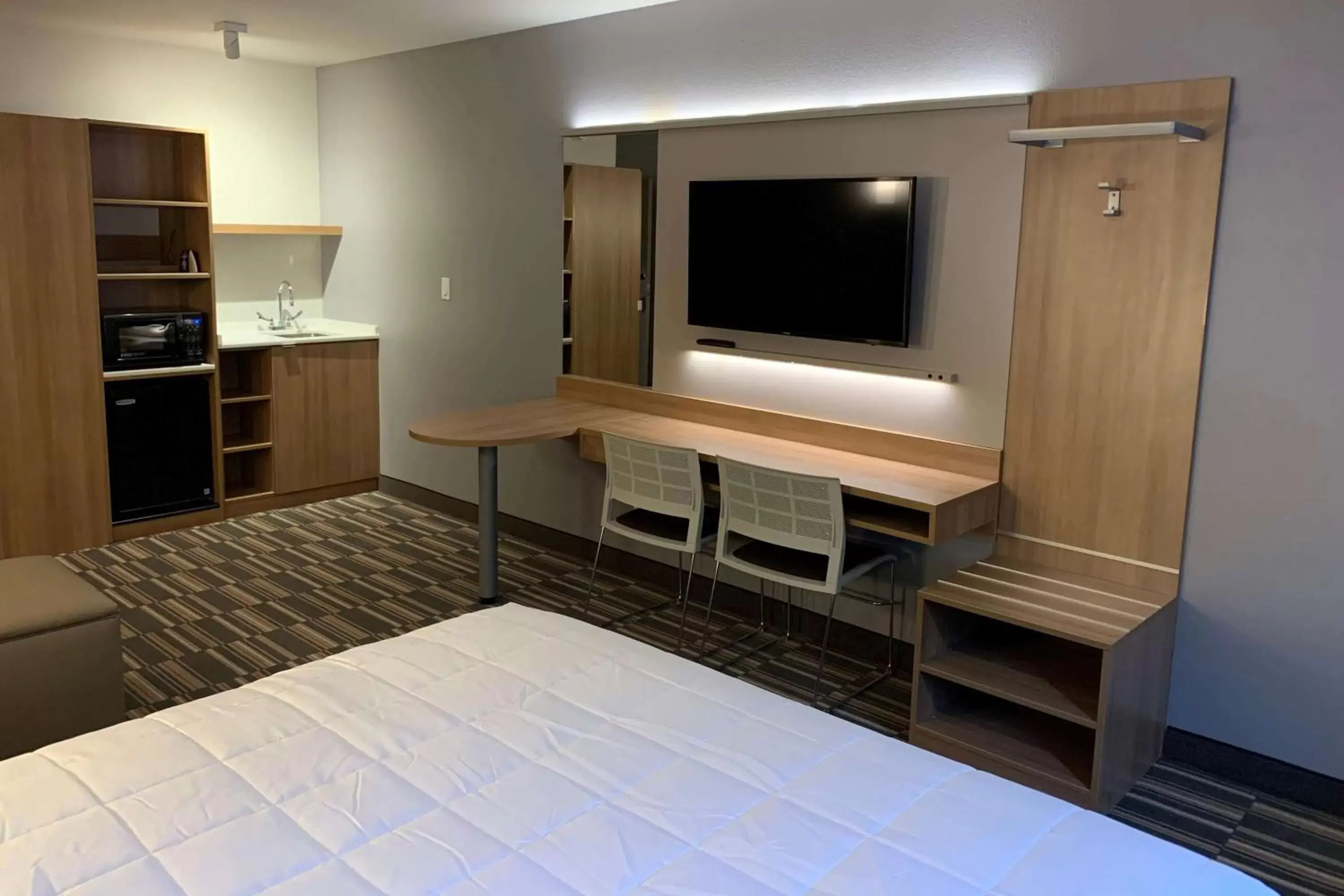 Photo of the whole room, TV/Entertainment Center in Microtel Inn & Suites by Wyndham Georgetown Lake