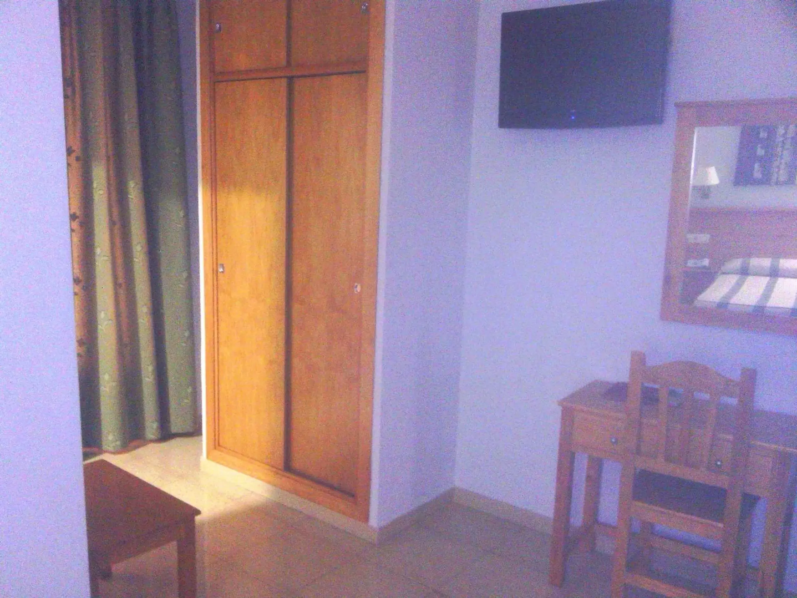 Photo of the whole room, TV/Entertainment Center in Hotel Goya