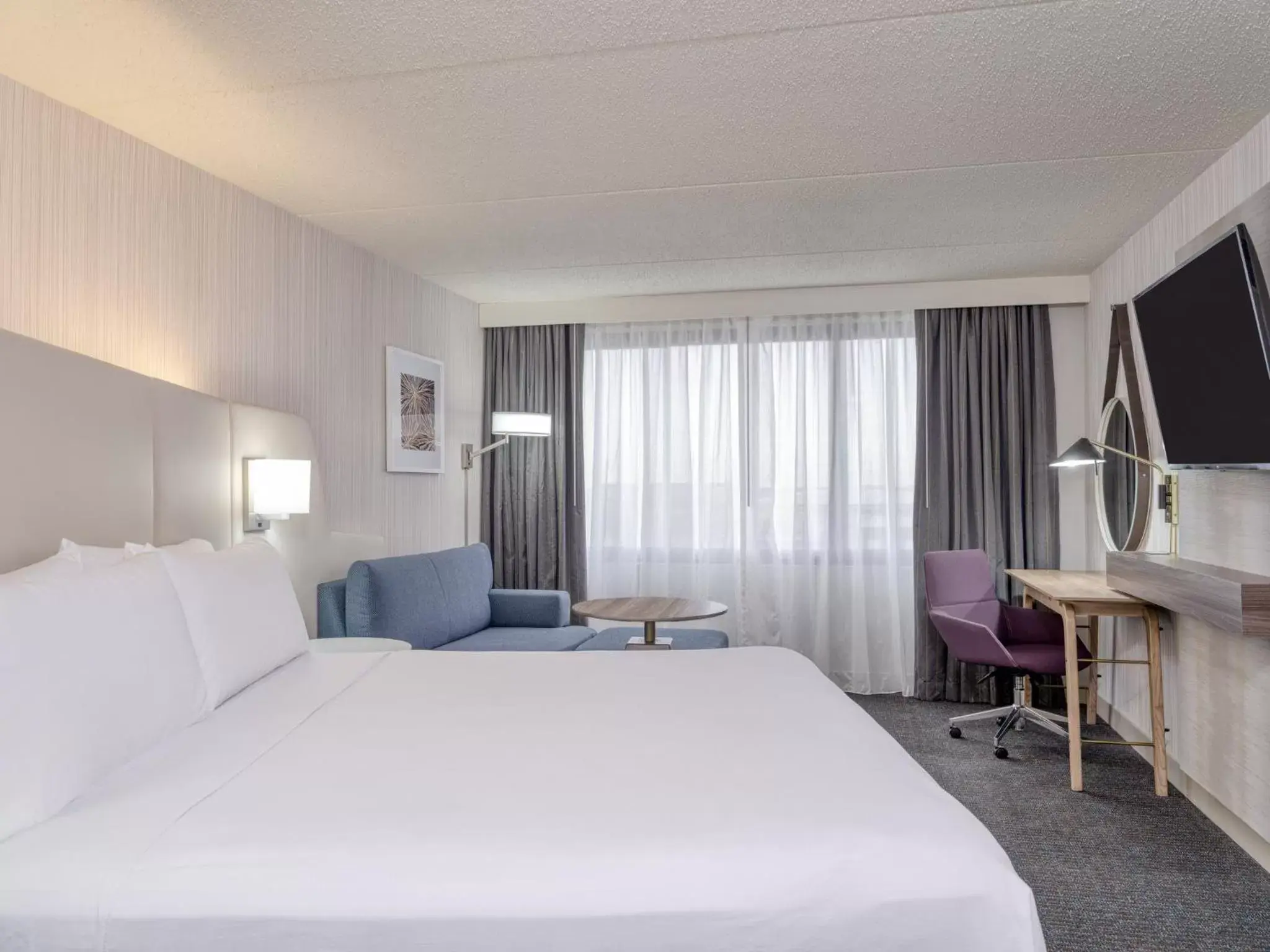 Photo of the whole room, Bed in Crowne Plaza Indianapolis-Airport, an IHG Hotel