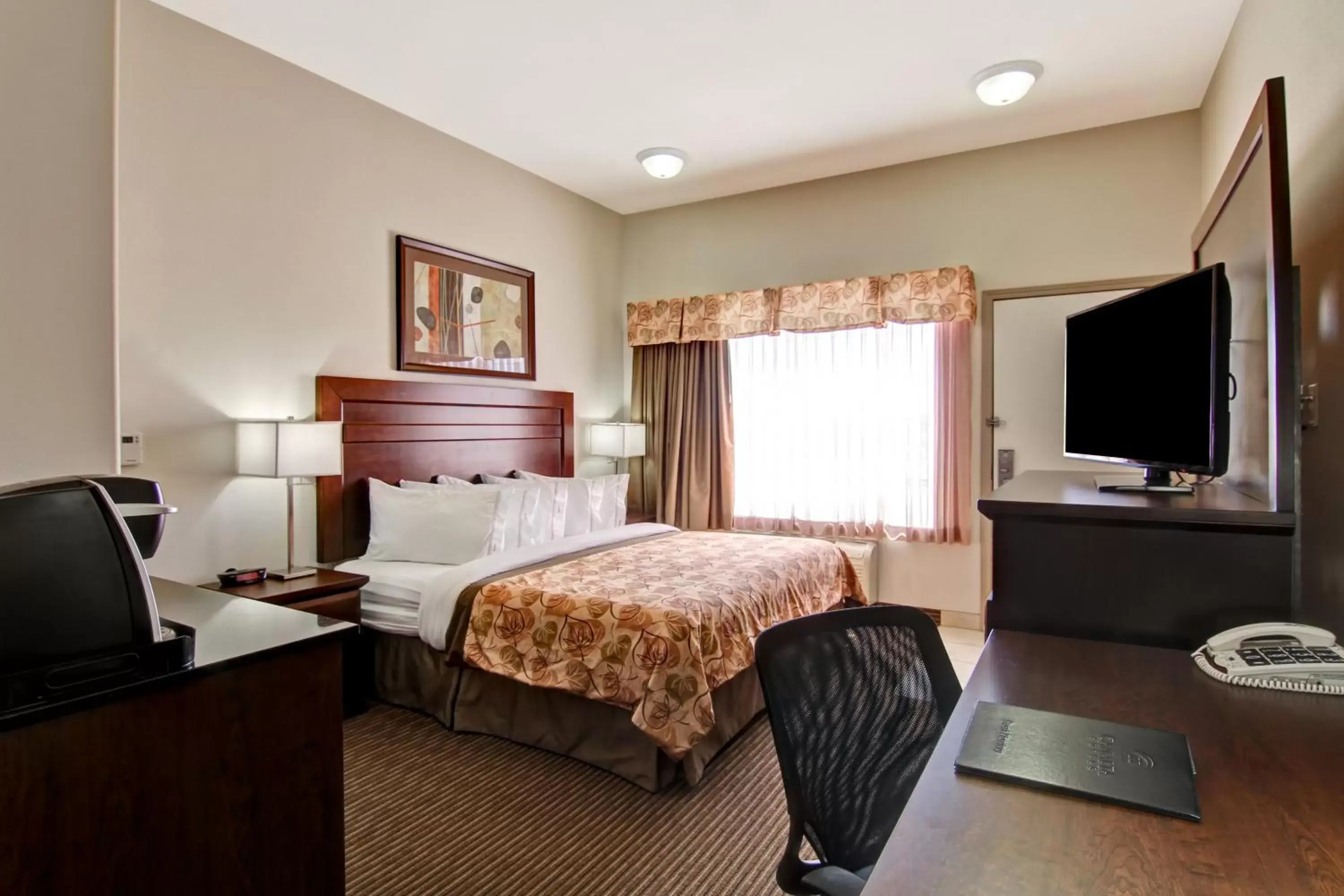 Bed in Canalta Hotel Weyburn