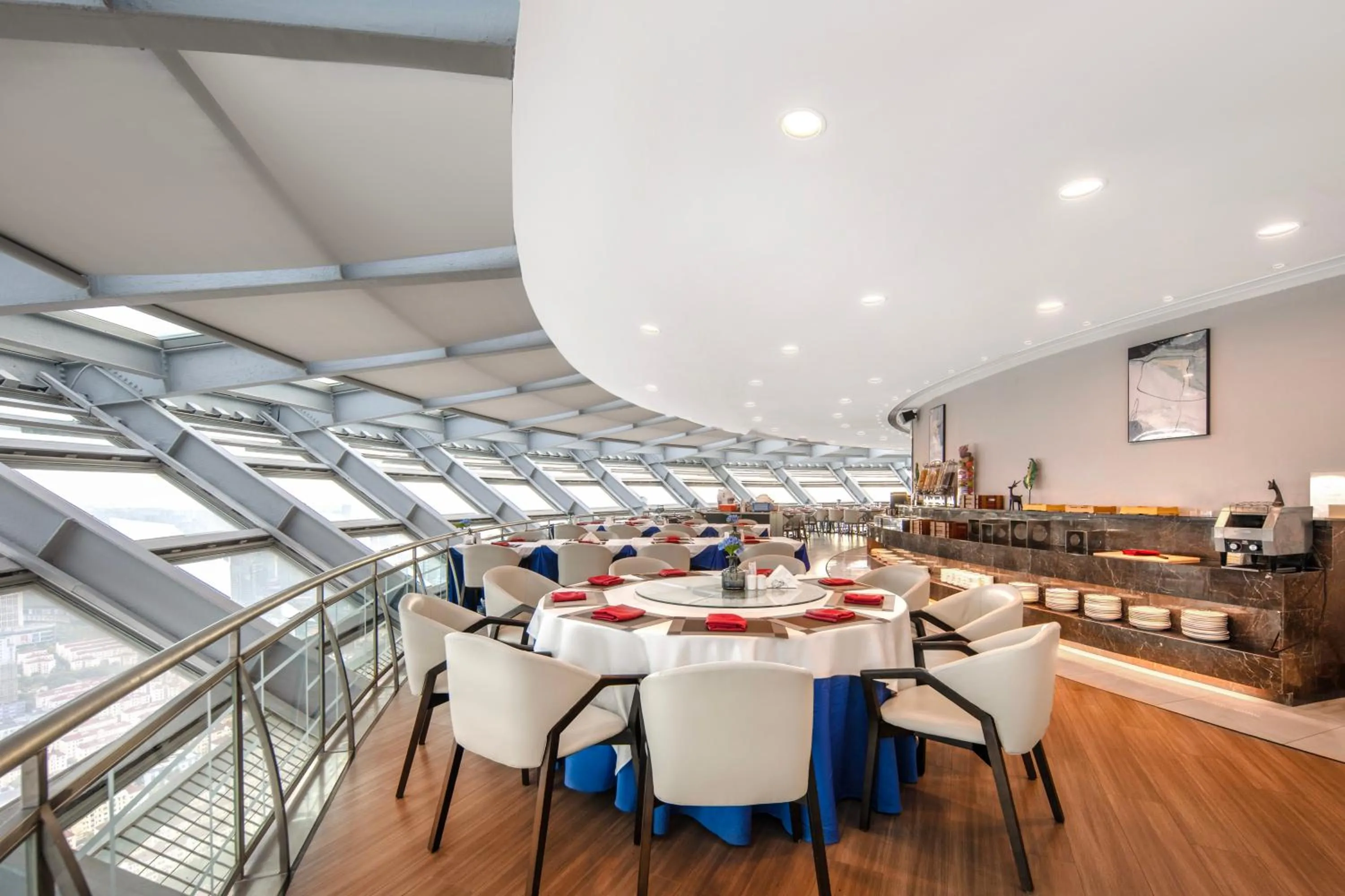 Restaurant/places to eat in Novotel Atlantis Shanghai - Enjoy our great-valued breakfast in our rooftop revolving restaurant with a stunning river view & utilize our FREE self-serviced laundry