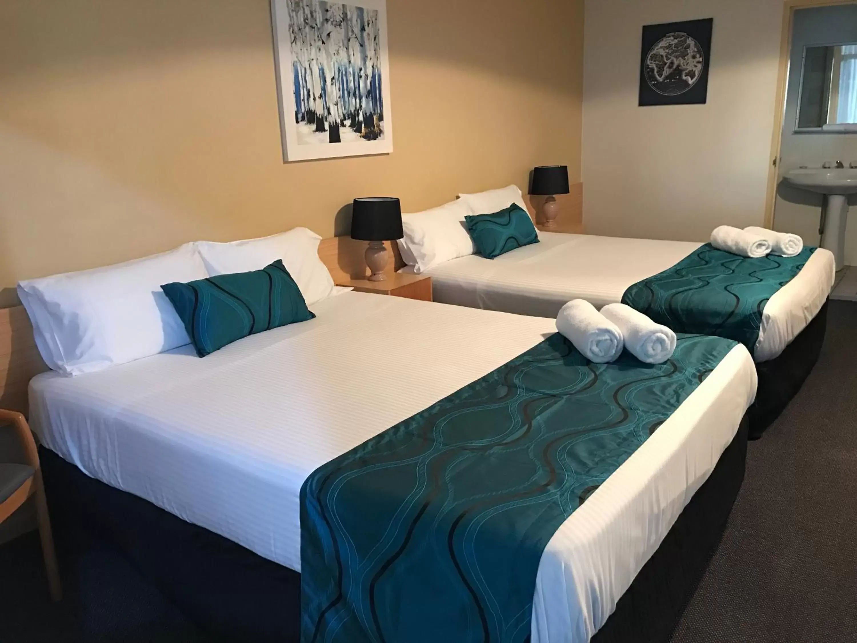 Photo of the whole room, Bed in The Q Motel Rockhampton