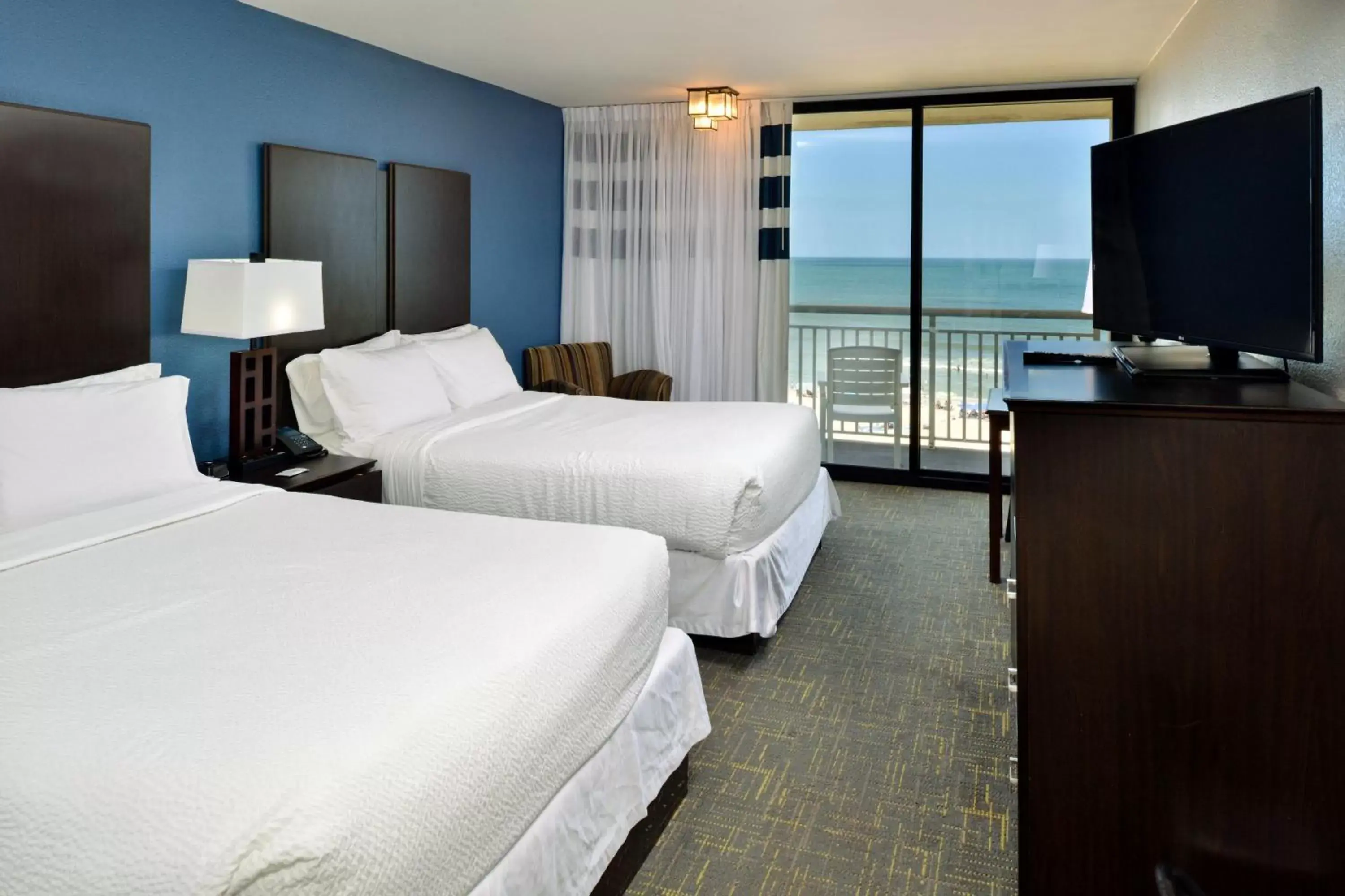 Photo of the whole room, Bed in Four Points by Sheraton Virginia Beach Oceanfront