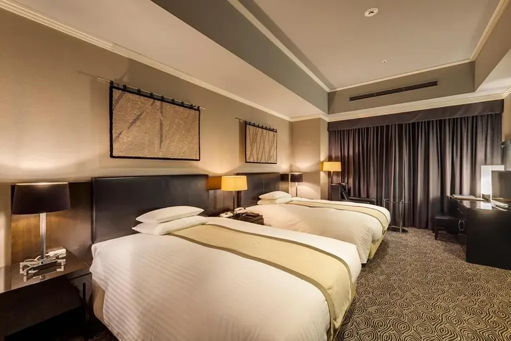 Bed in Hotel Nikko Kumamoto