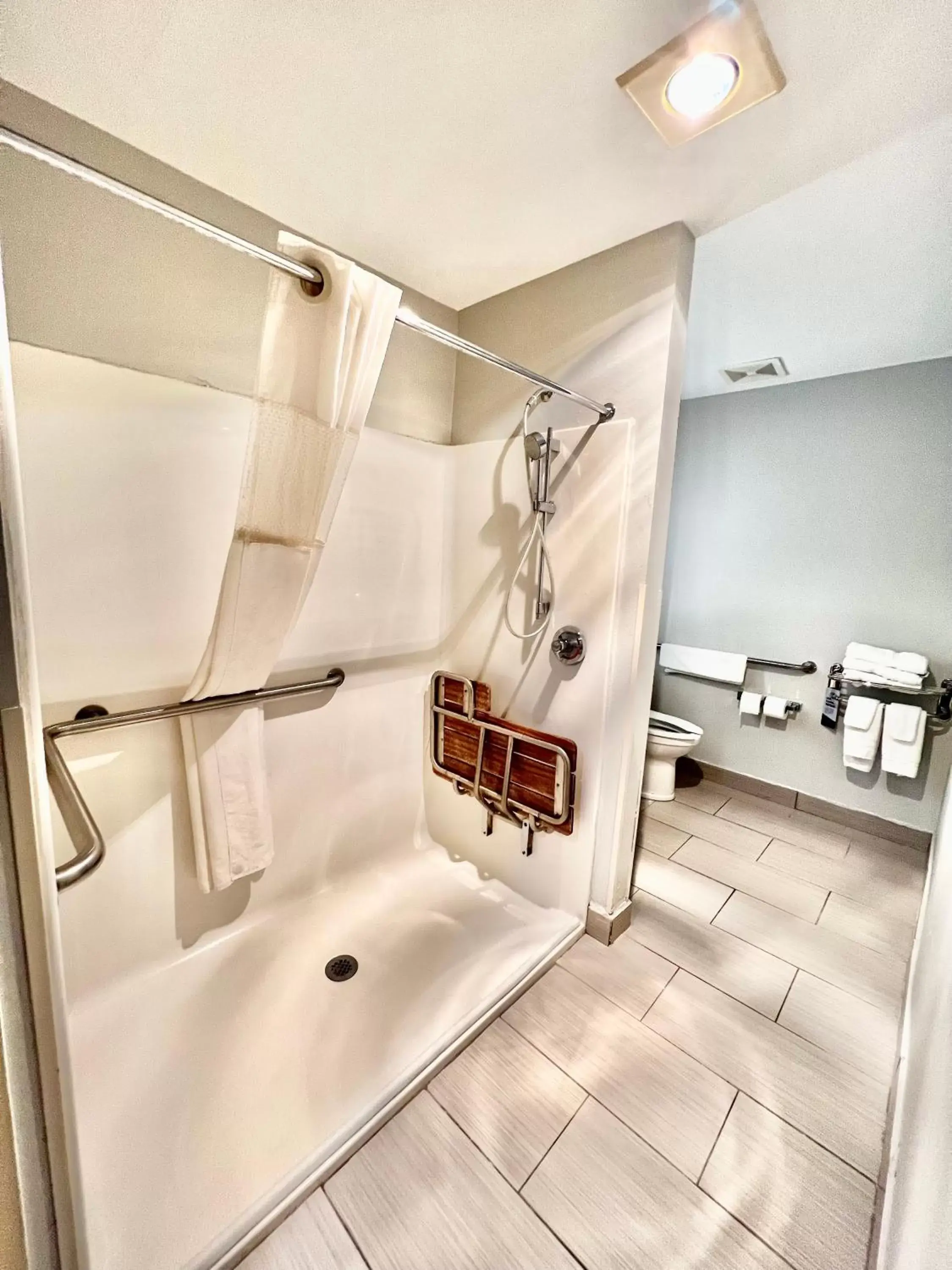 Bathroom in Microtel Inn by Wyndham Janesville