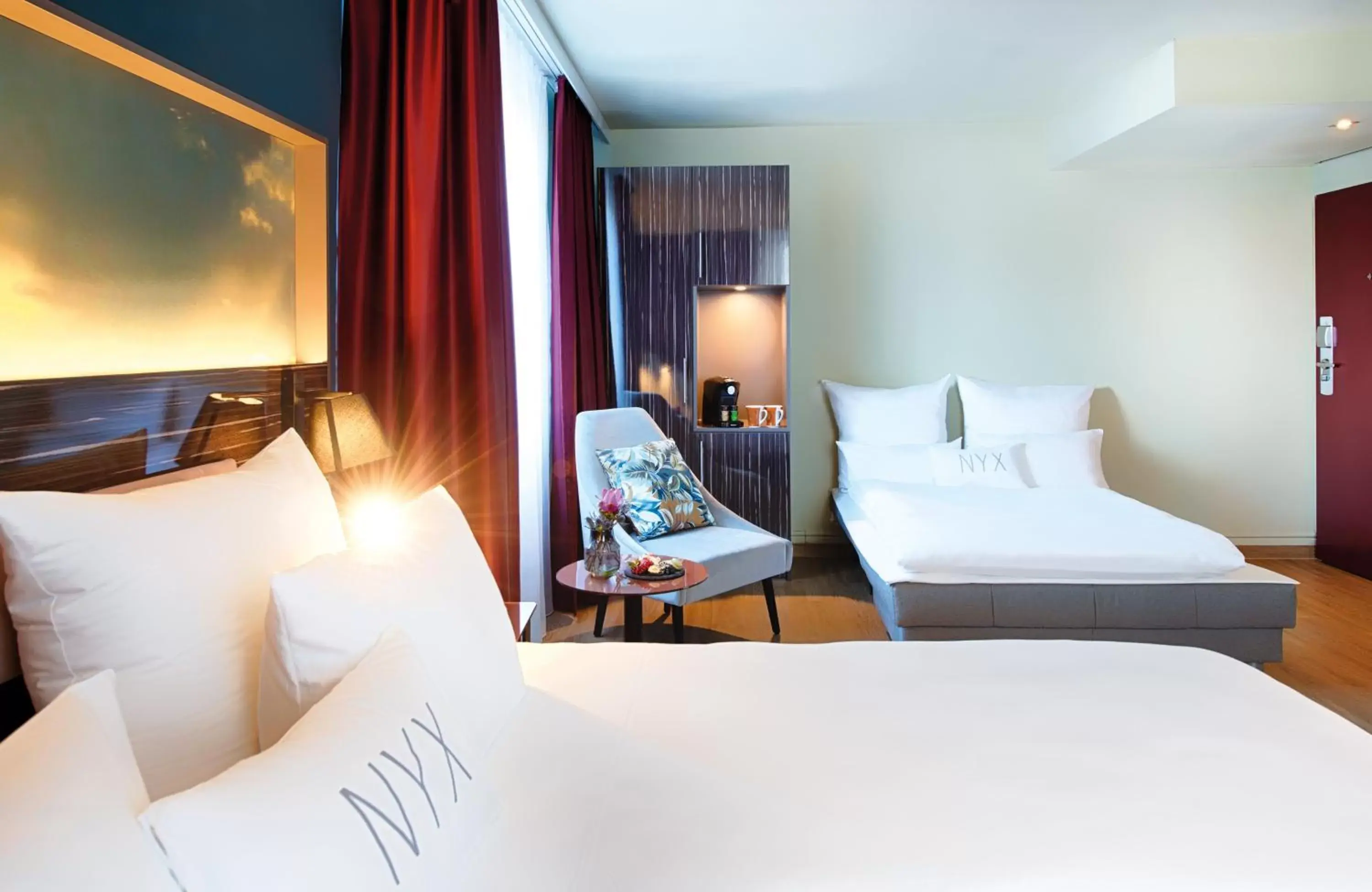 Photo of the whole room, Bed in NYX Hotel Mannheim by Leonardo Hotels