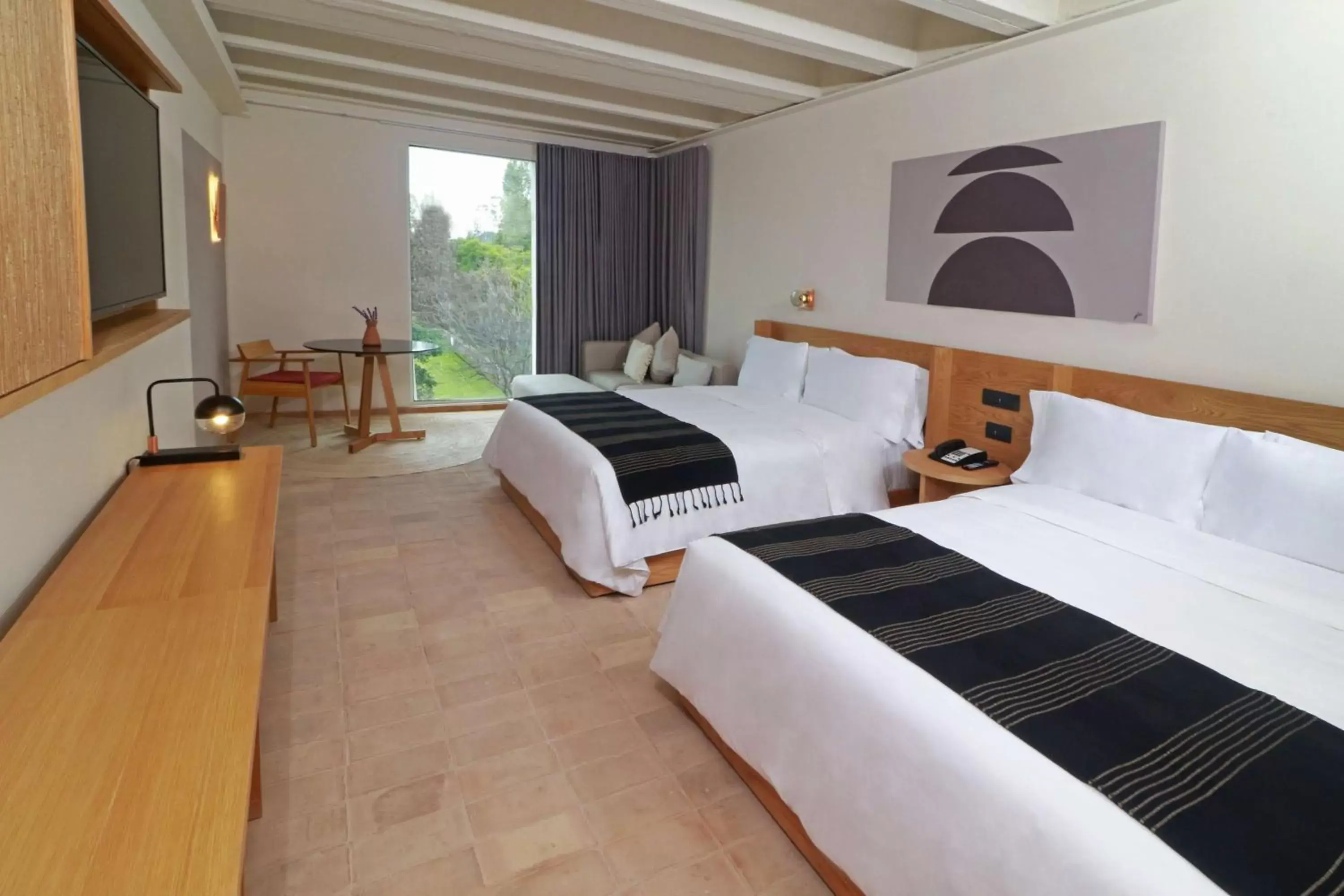 Living room, Bed in Albor San Miguel de Allende, Tapestry Collection by Hilton Living room, Bed in Albor San Miguel de Allende, Tapestry Collection by Hilton