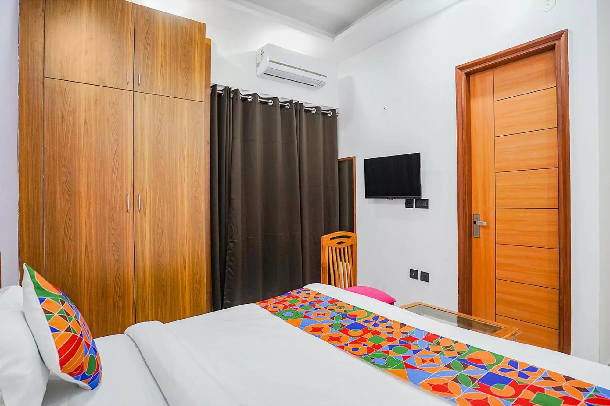 Bed in FabHotel Sunrise Sector 56