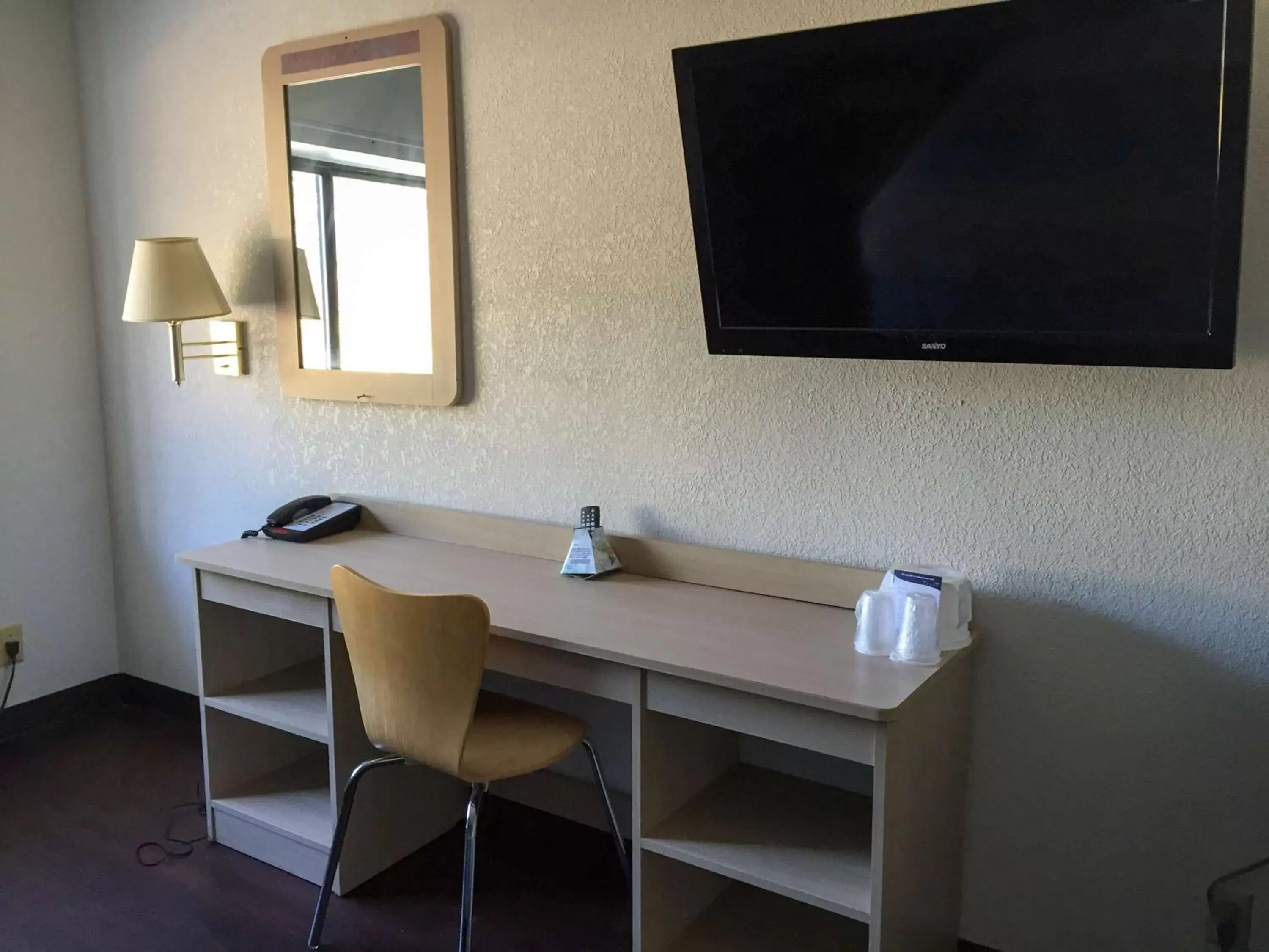 Photo of the whole room, TV/Entertainment Center in Motel 6-Norcross, GA