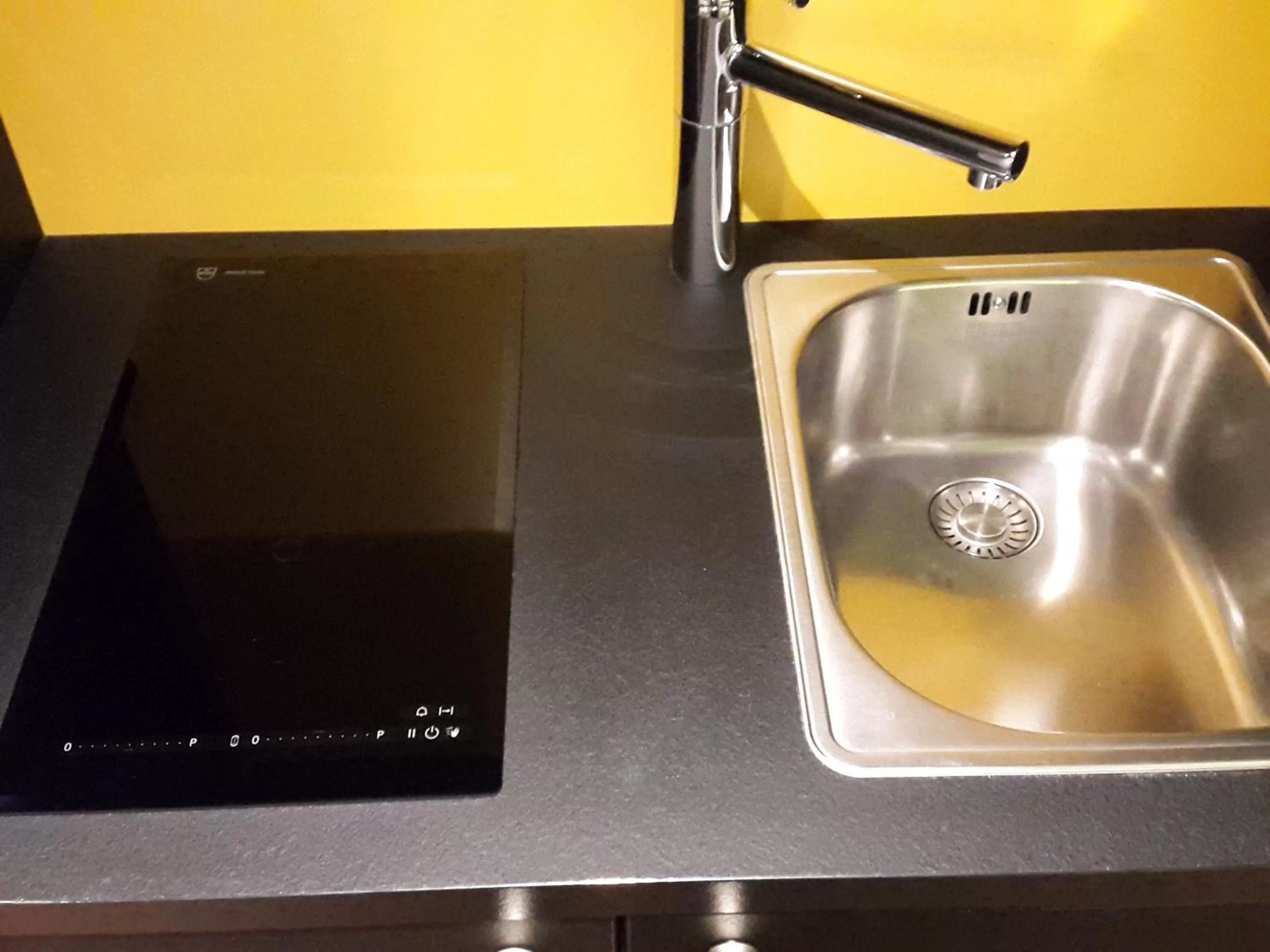 Kitchen or kitchenette in Swiss Wine by Fassbind