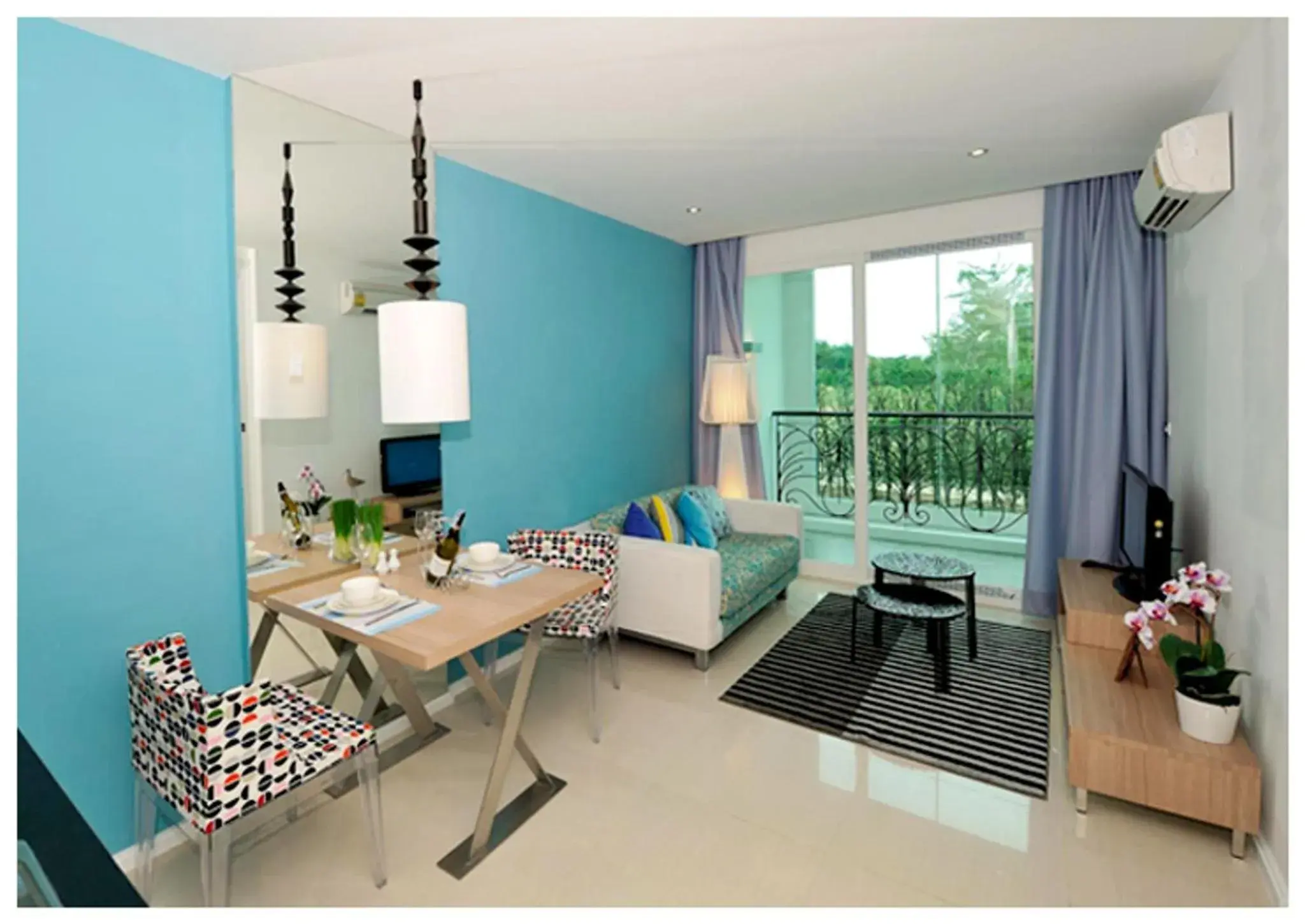 Living room, Dining Area in Atlantic Condo Resort Pattaya by Panisara