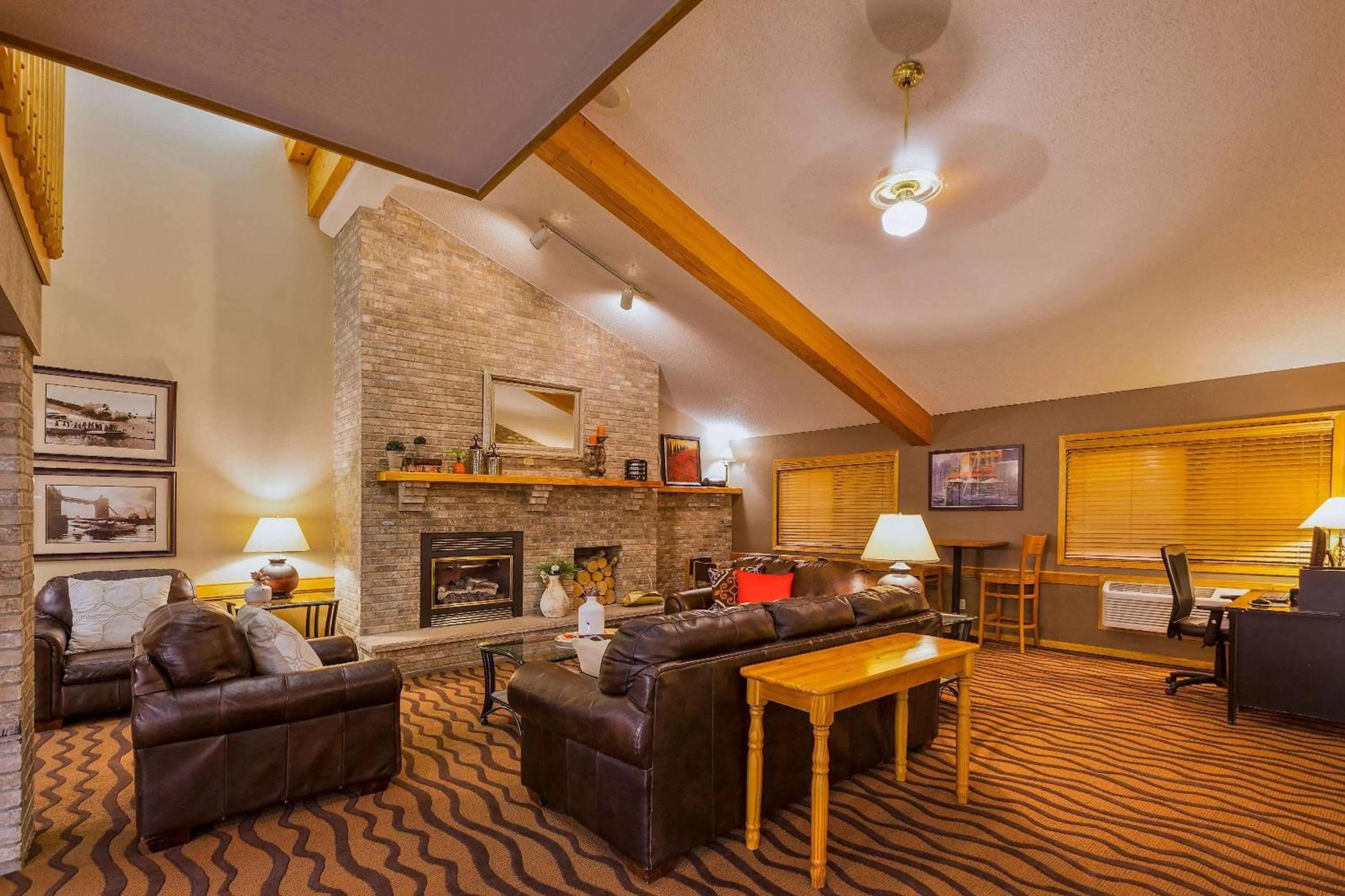 Seating area in AmericInn by Wyndham Algona