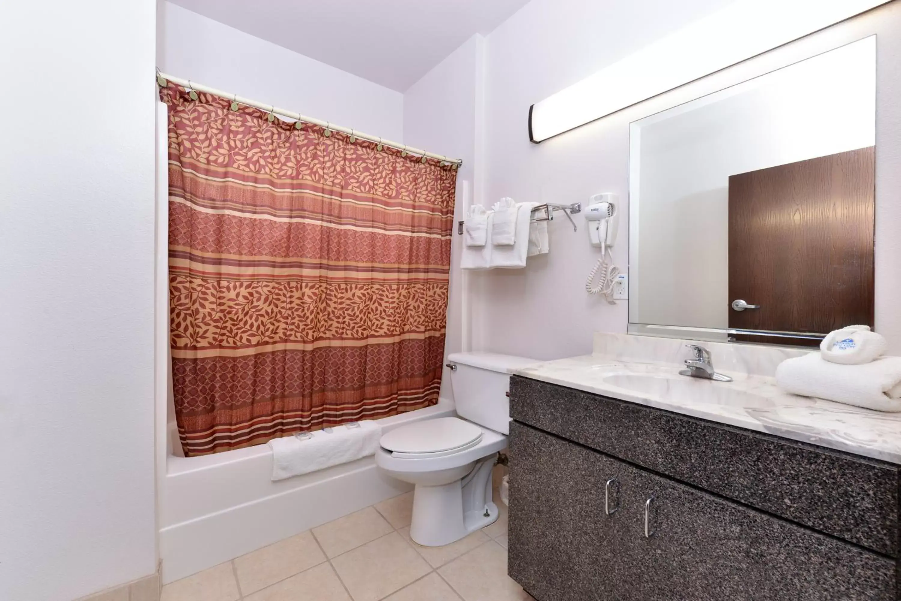 Bathroom in Americas Best Value Inn Somerville Texas