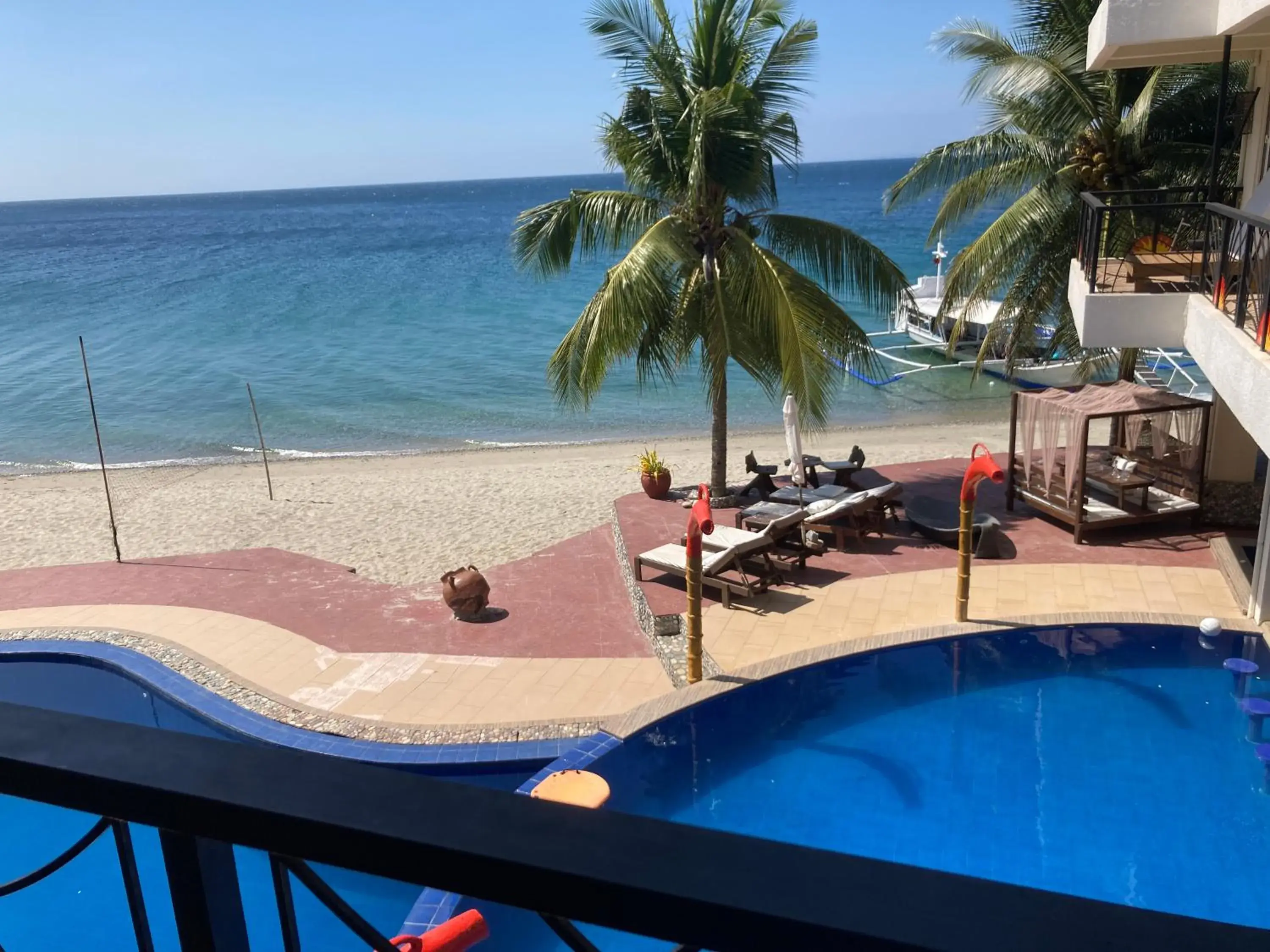 Pool View in Sunset At Aninuan Beach Resort