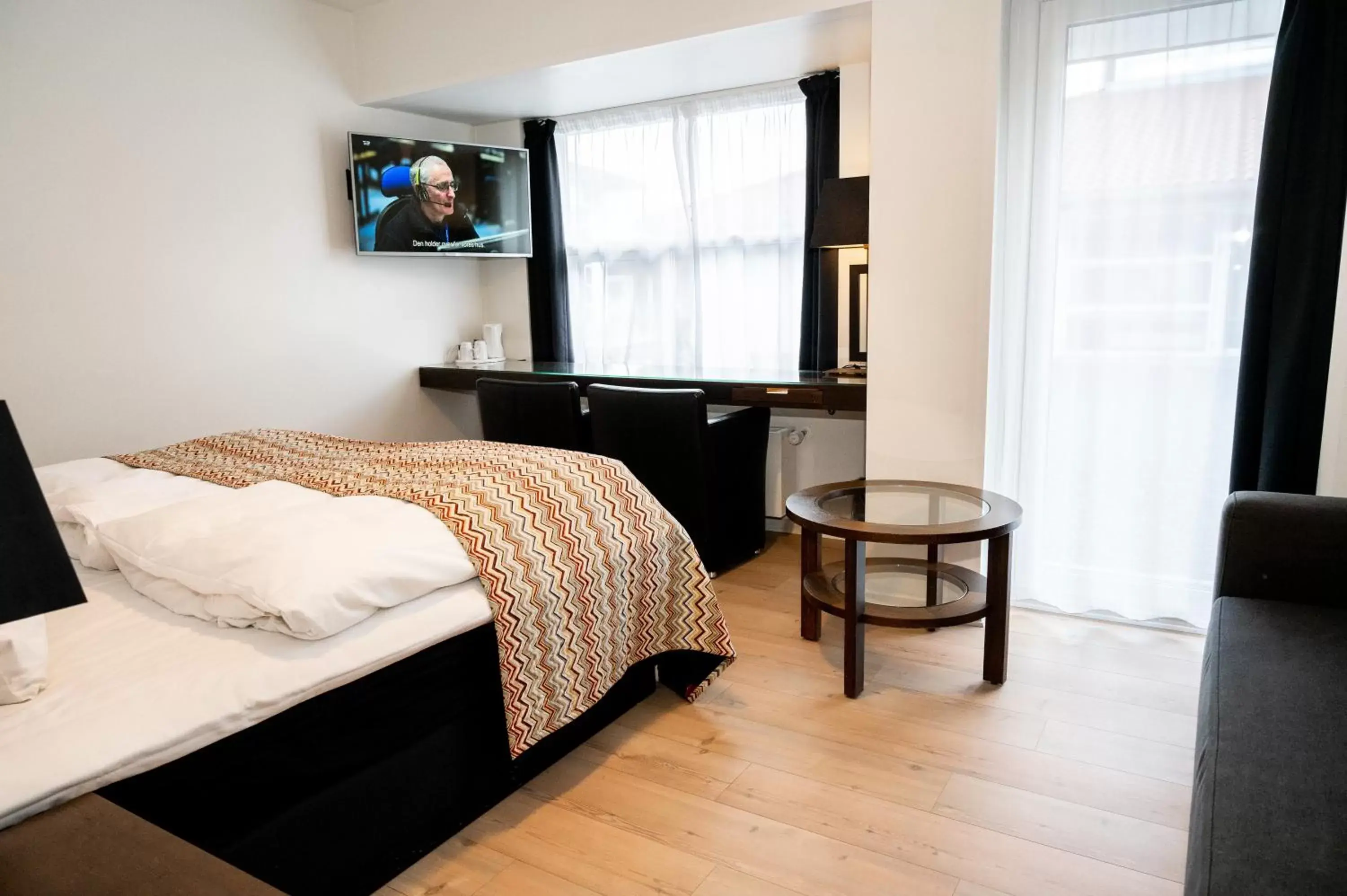 TV and multimedia, TV/Entertainment Center in Hotel Svanen Billund