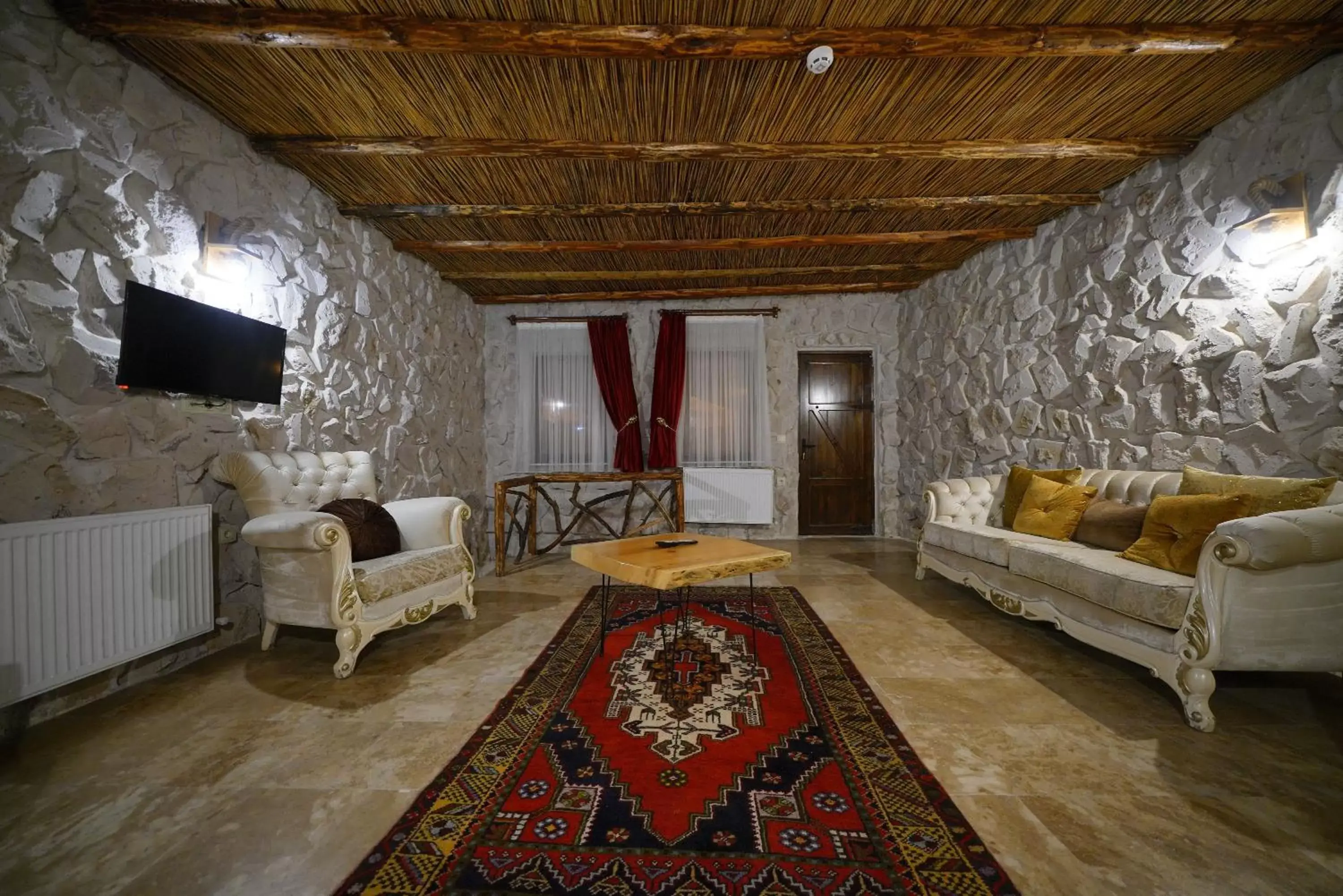 Communal lounge/ TV room, Seating Area in Cappadocia Nar Cave House & Hot Swimming Pool