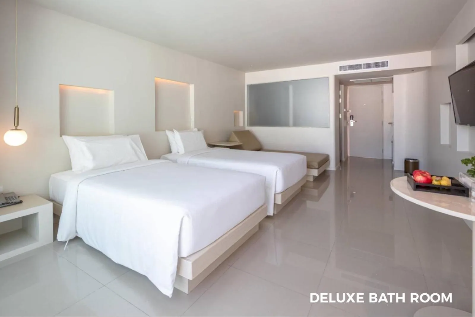 Bed in Prima Hotel Pattaya