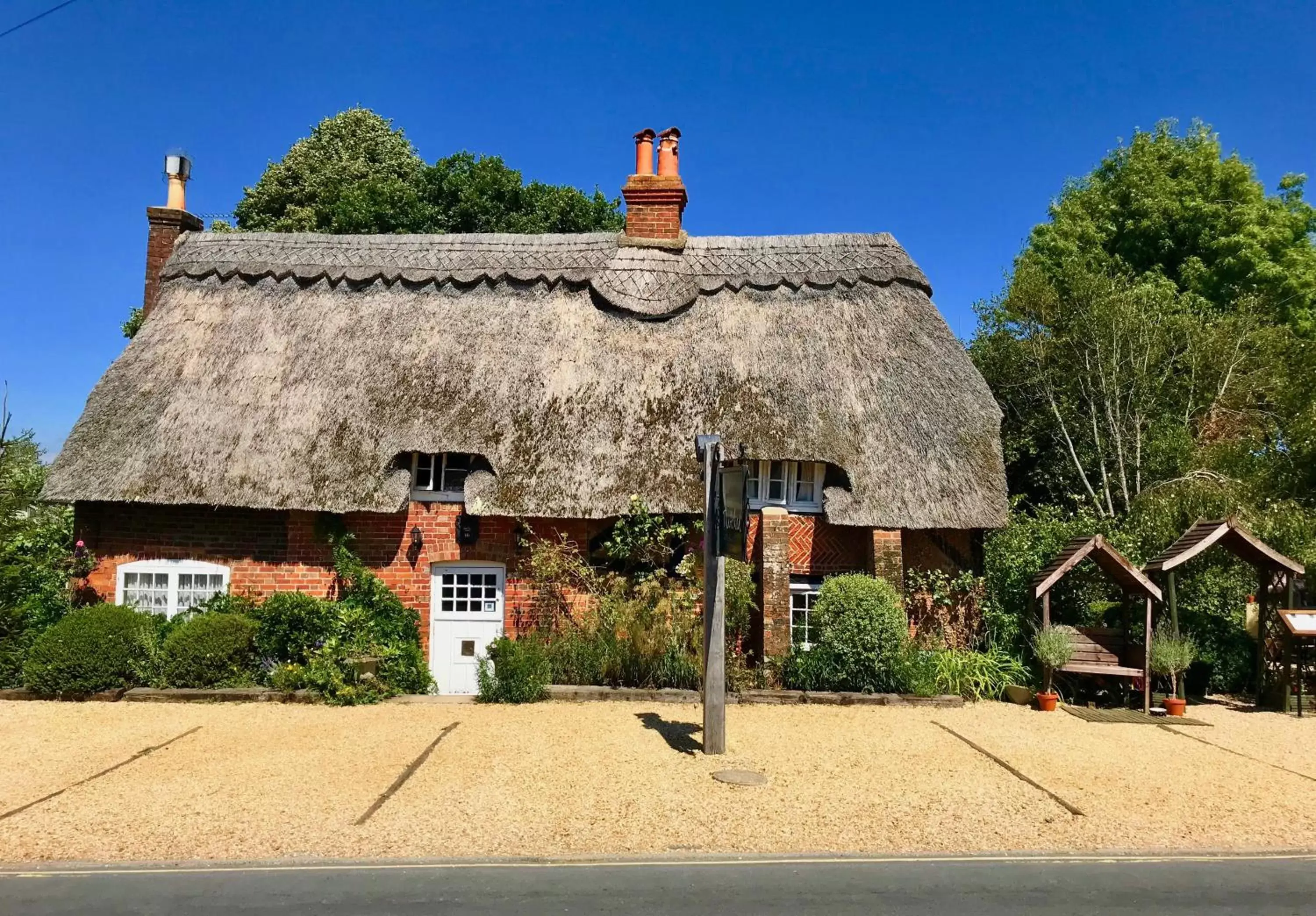 Property Building in Thatched Cottage Hotel