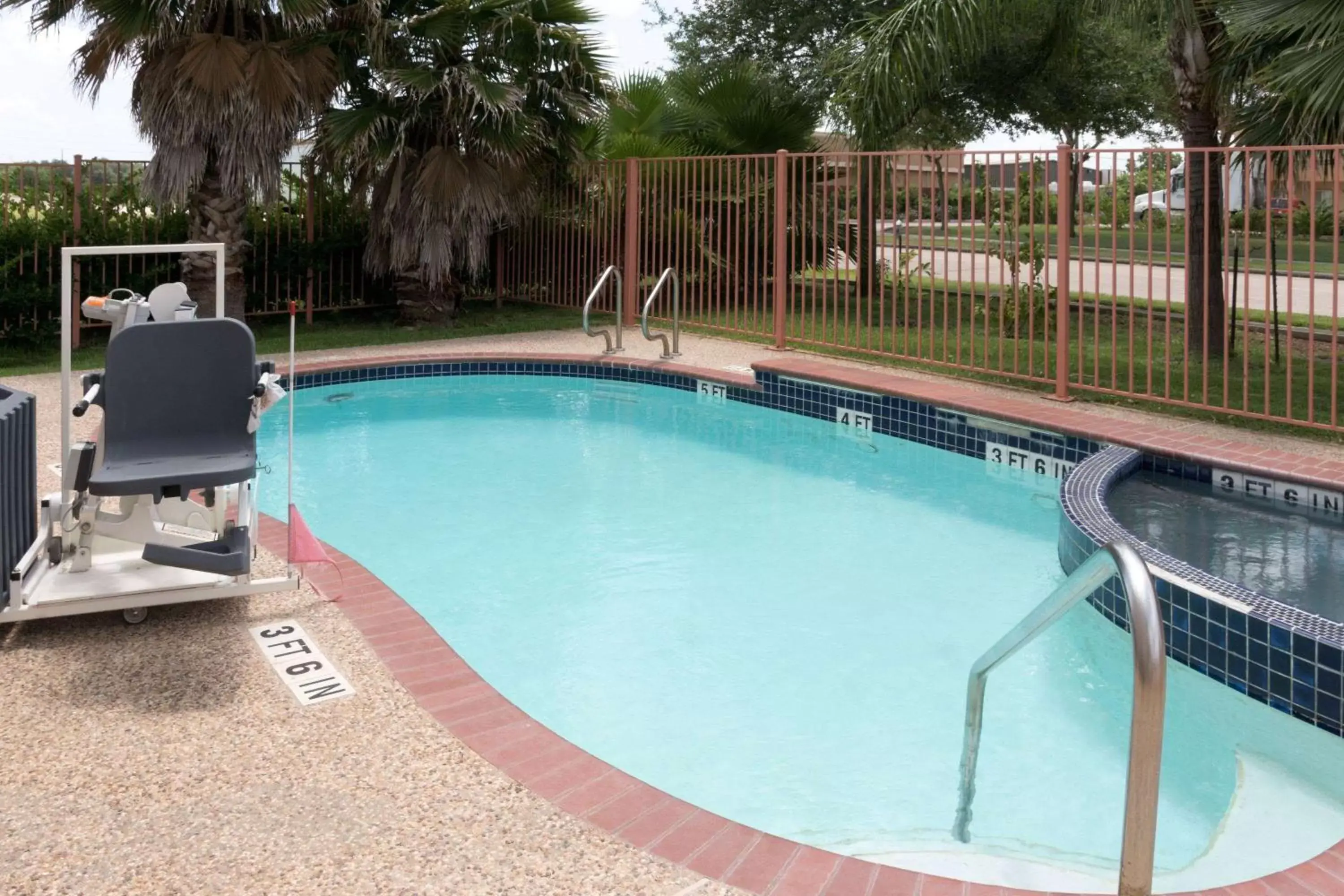 On site, Swimming Pool in Super 8 by Wyndham Stafford Sugarland Area
