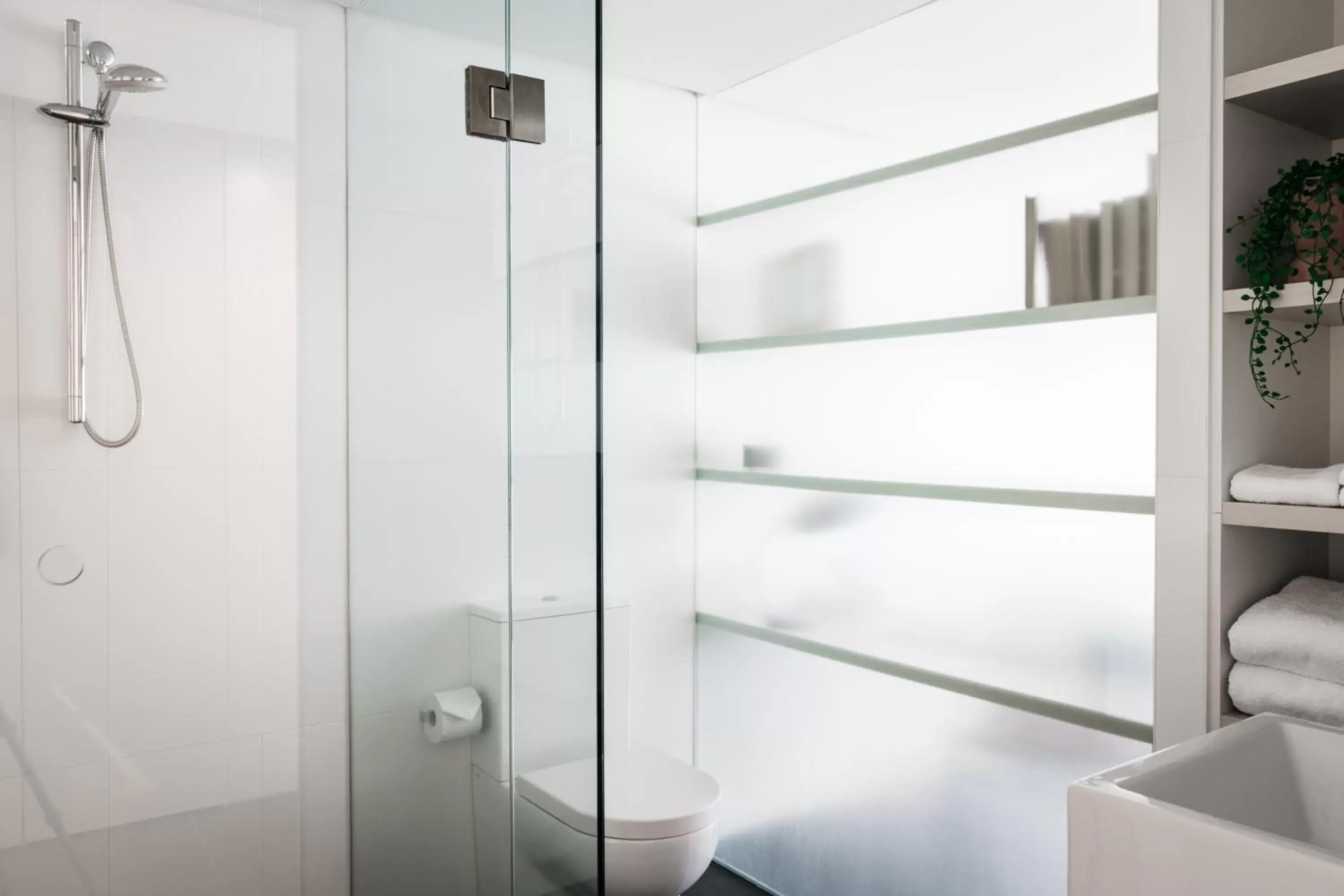 Shower, Bathroom in Nishi Apartments Eco Living by Ovolo