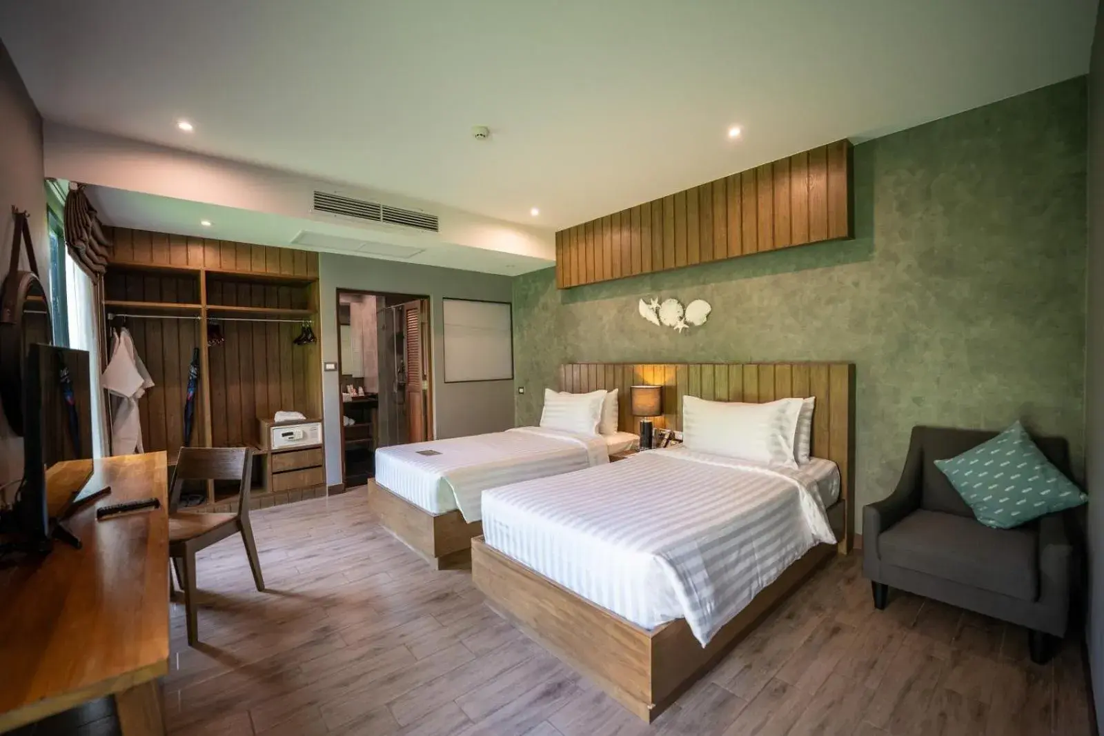 Bed in Coral Tree Villa Huahin