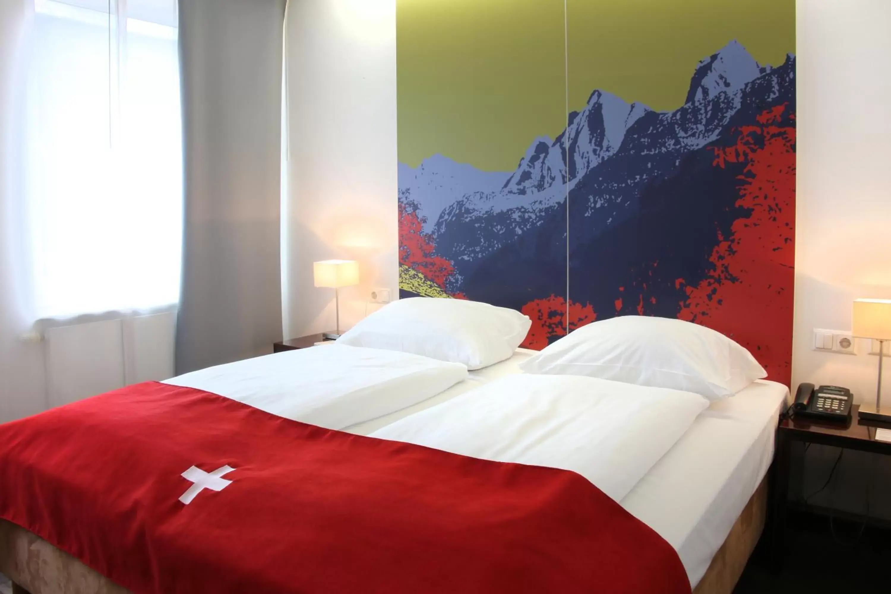 Bedroom, Bed in Helvetia Hotel Munich City Center