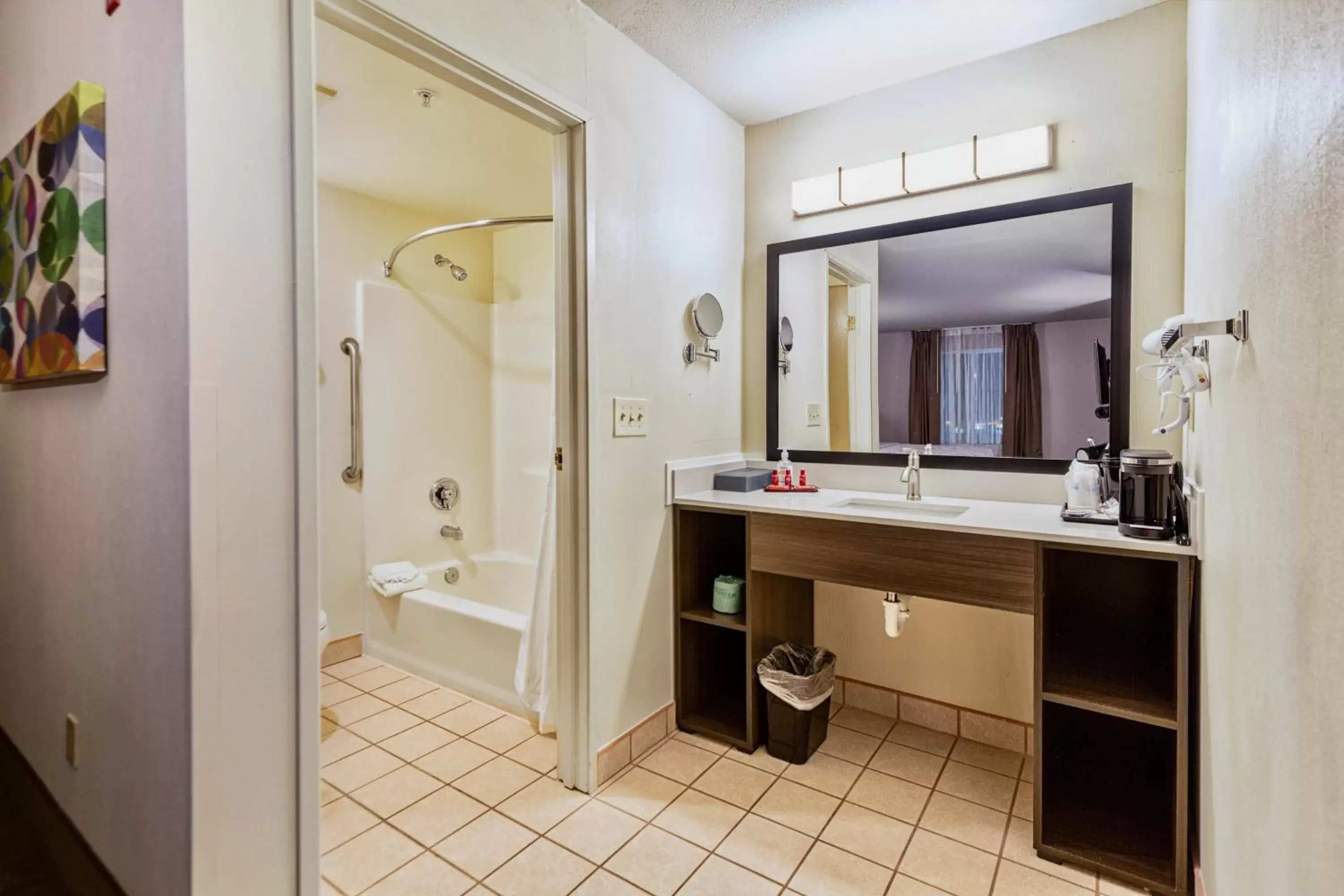 Bathroom in SureStay Plus Hotel by Best Western SeaTac Airport