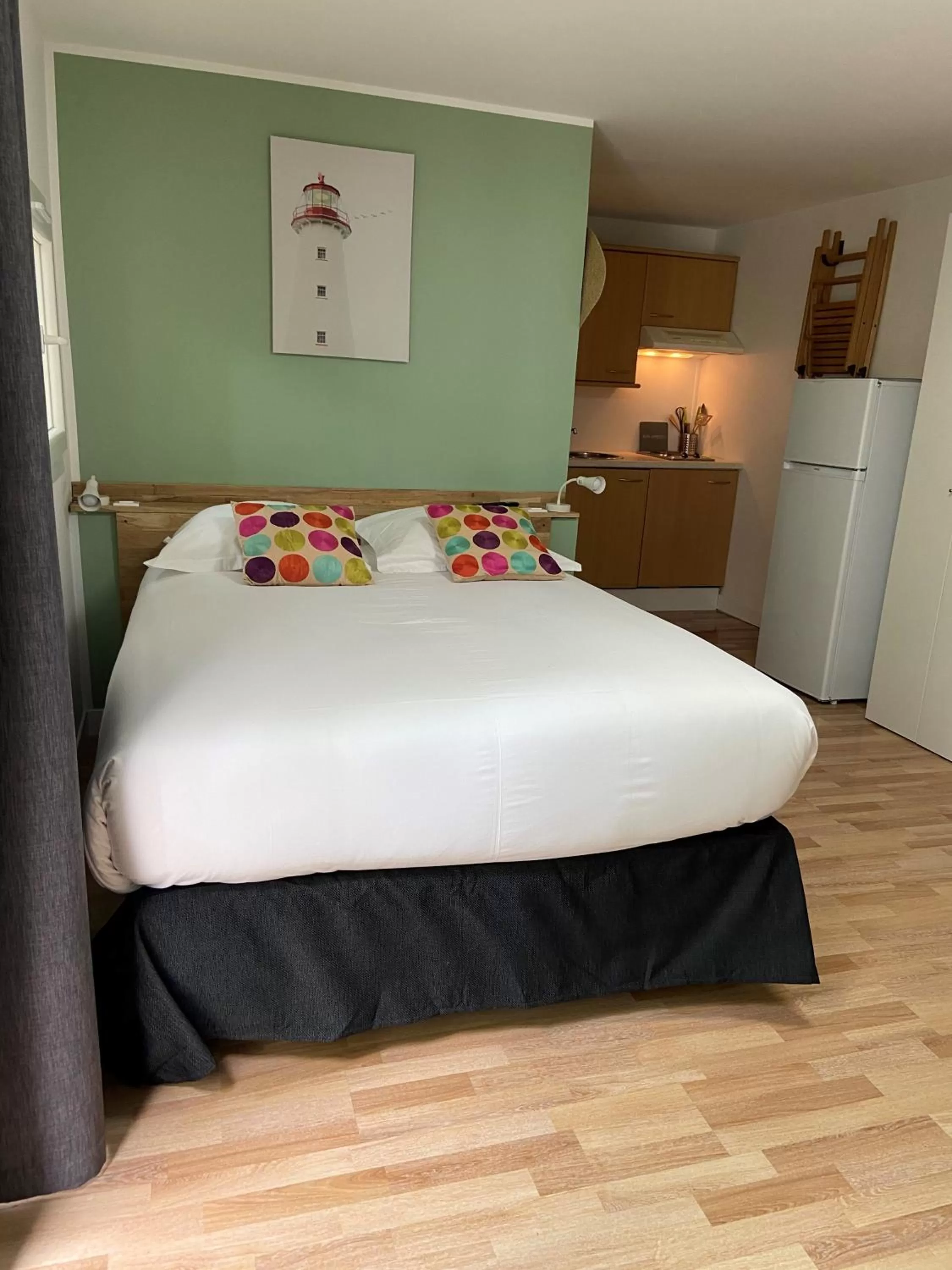 Bed in Le Thimothée : Hôtel & Studios