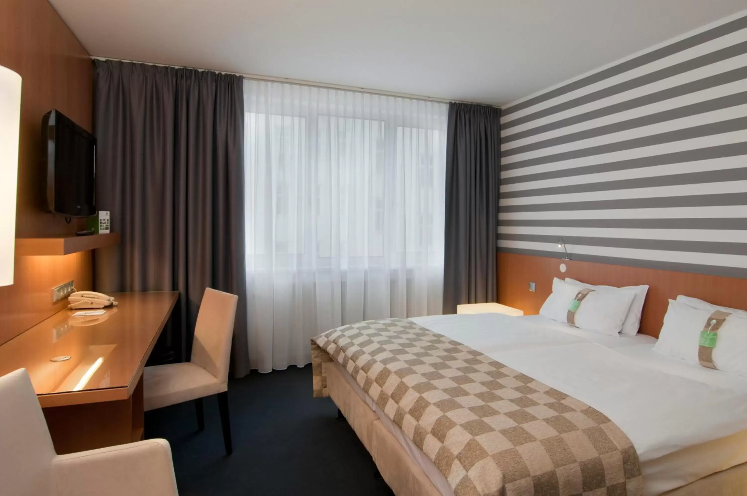 Photo of the whole room, Bed in Holiday Inn Vienna City, an IHG Hotel