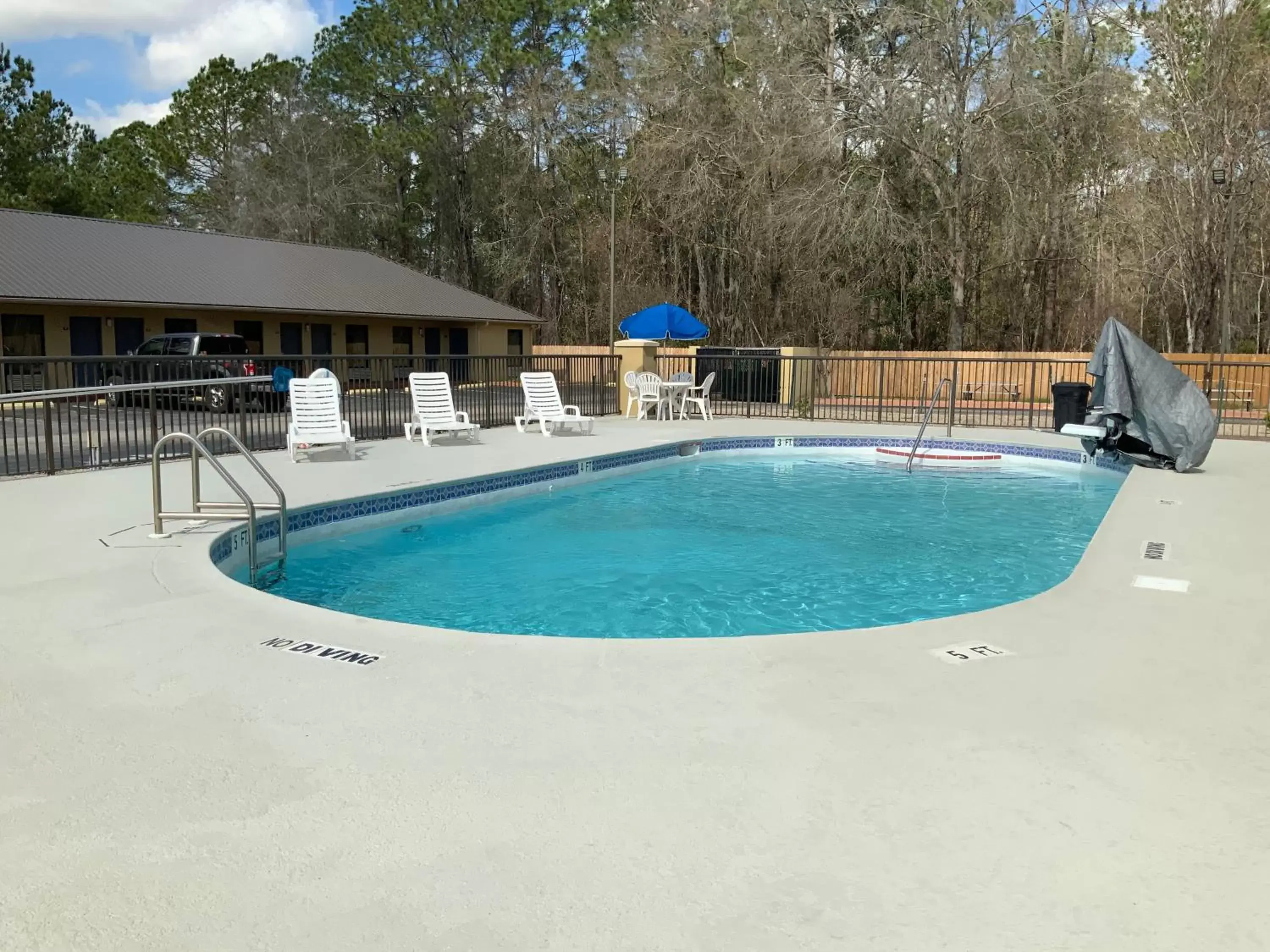 Patio, Swimming Pool in Days Inn by Wyndham Lake City I-10