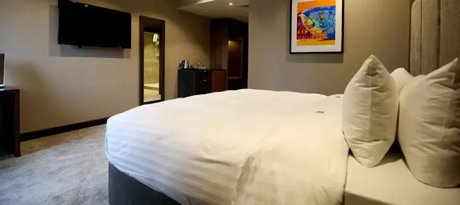 Bed in Ten Square Hotel