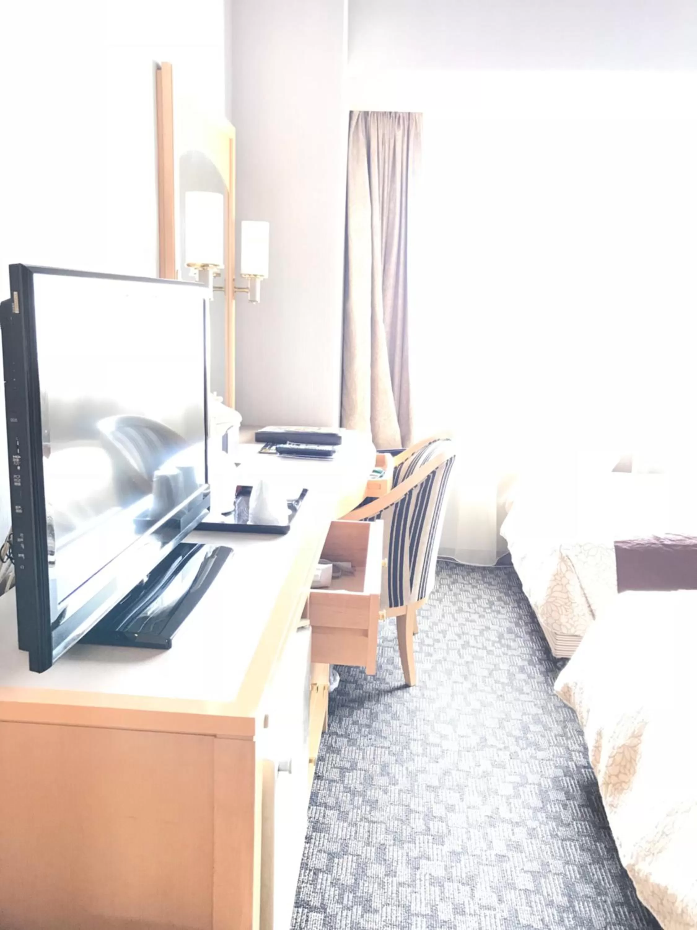 Bed in Numazu River Side Hotel