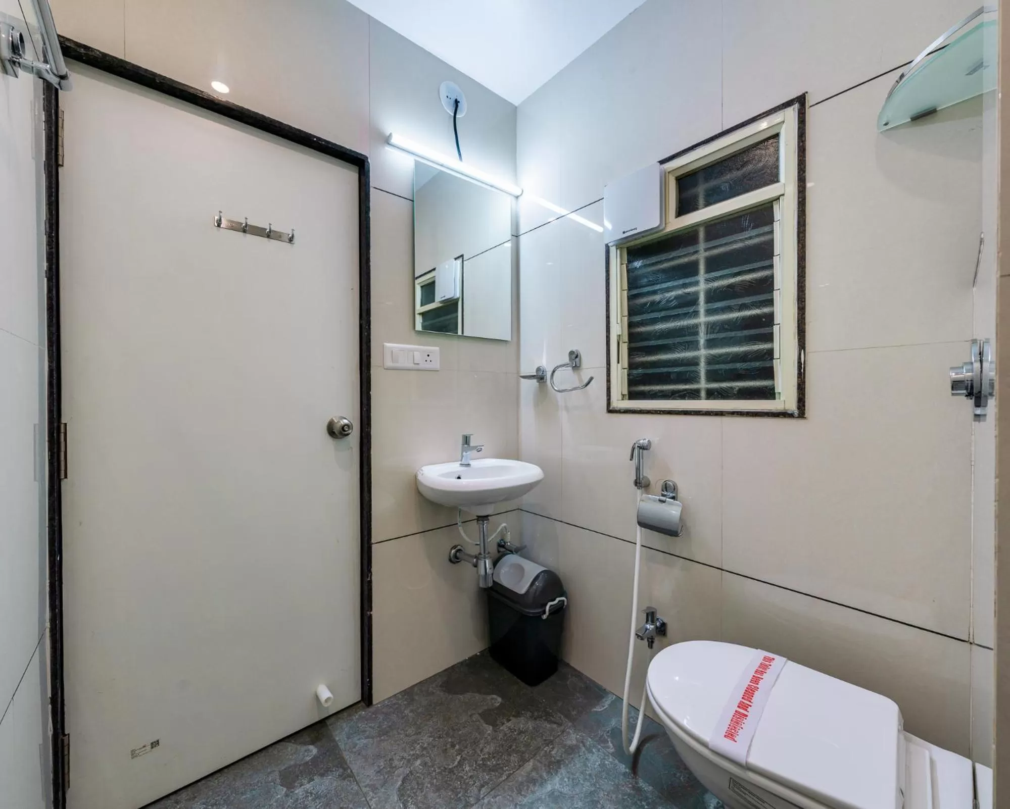 Bathroom in Hotel Aatithya Satkar Near Mahalaxmi Temple