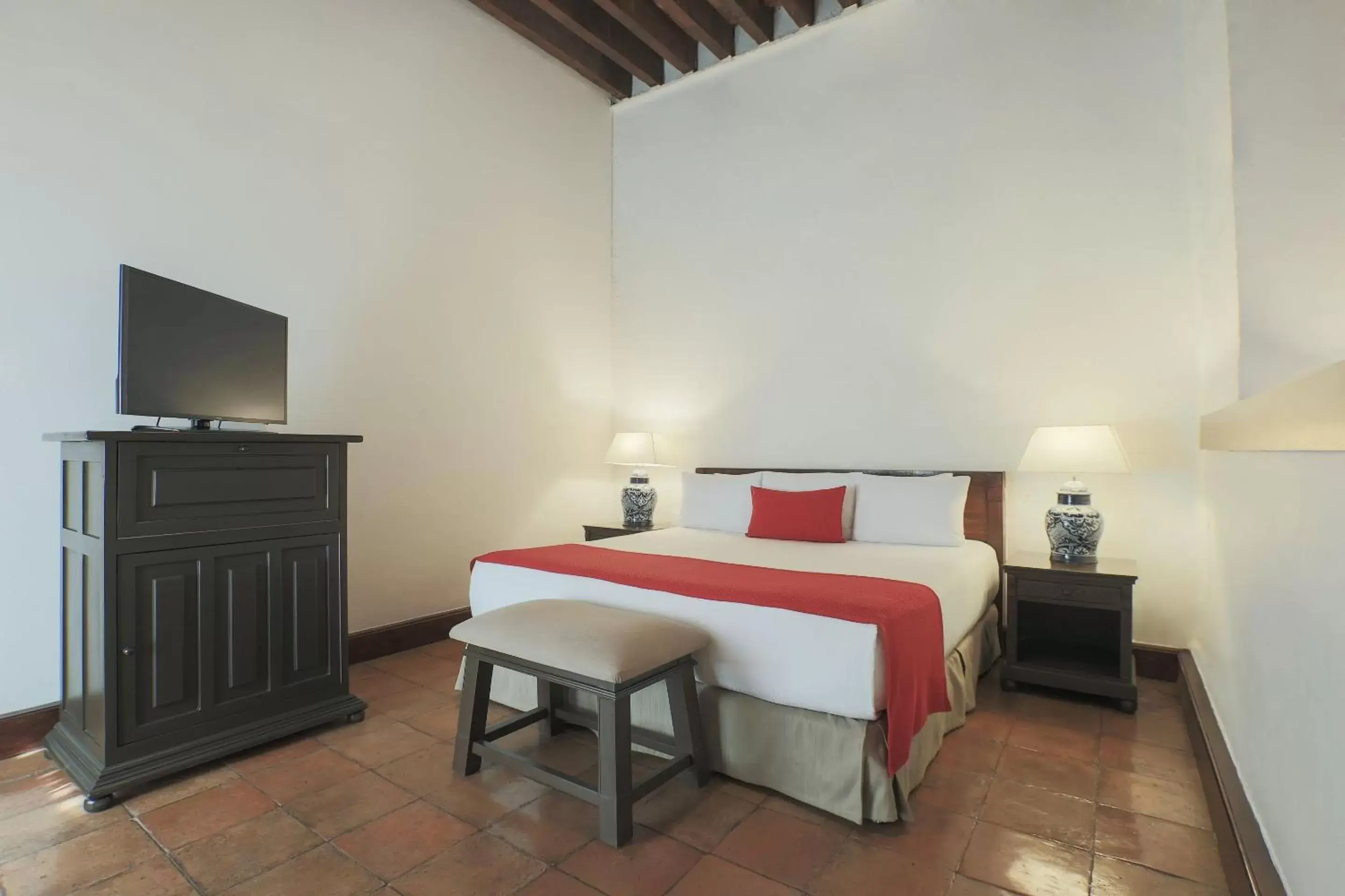 Photo of the whole room, Bed in Quinta Real Oaxaca