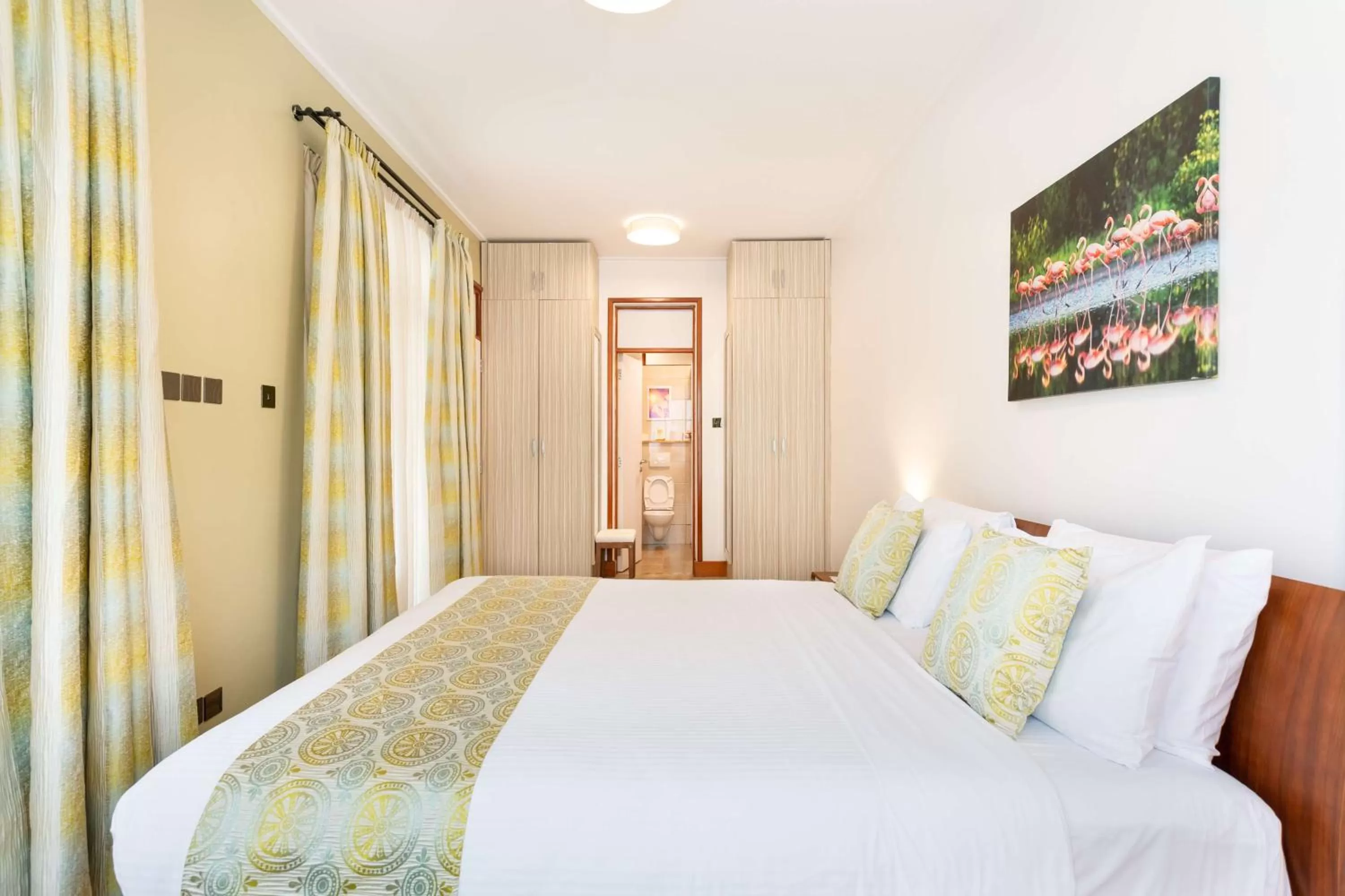 Toilet, Bed in Executive Residency by Best Western Nairobi