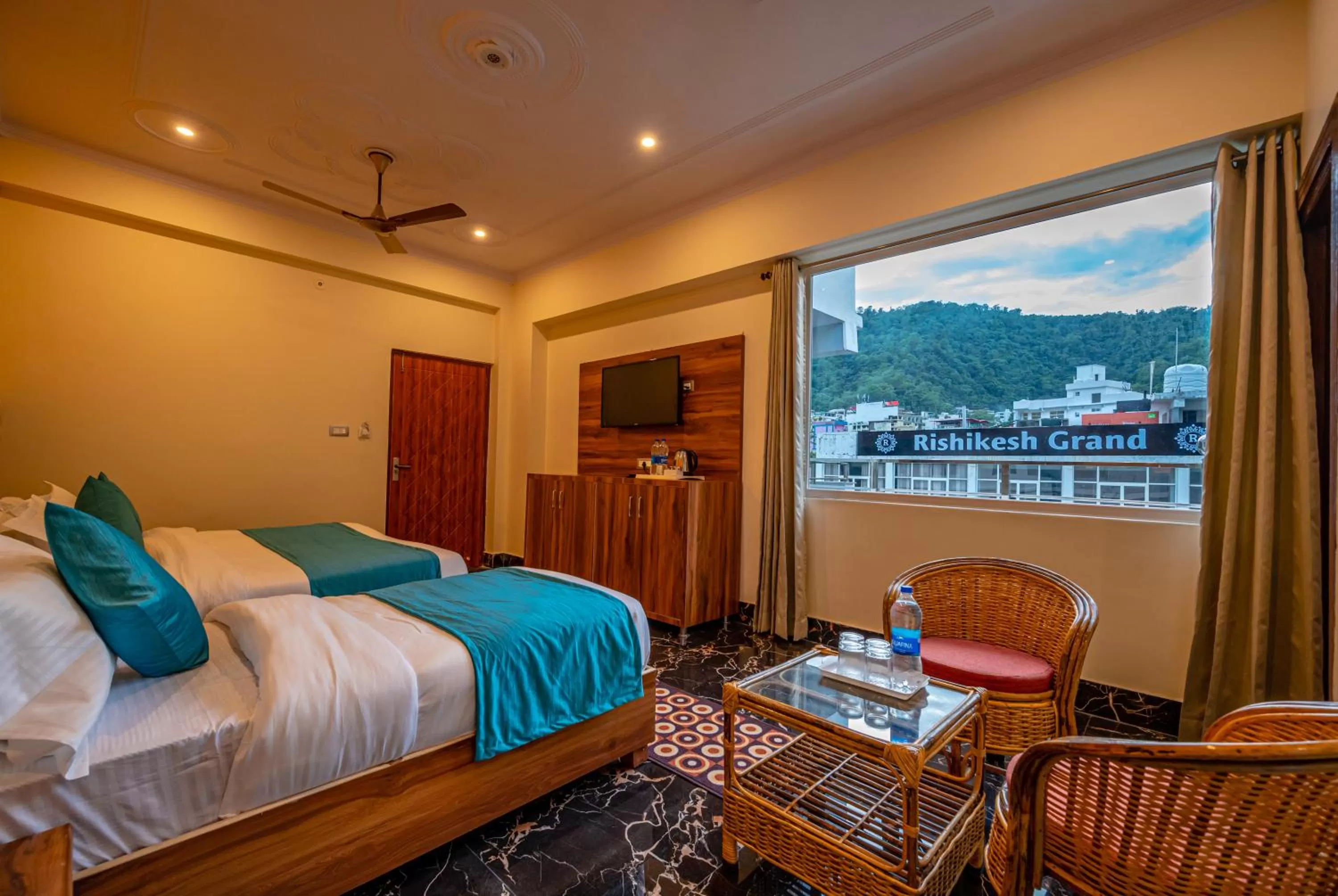Photo of the whole room, Bed in Hotel Rishikesh Grand by Kool Stays