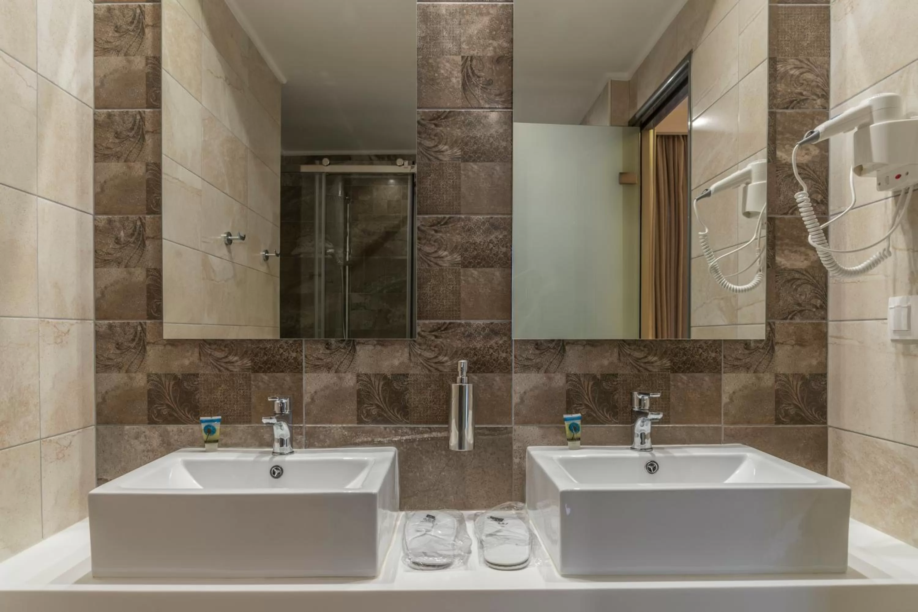 Bathroom in Agrelli Hotel & Suites