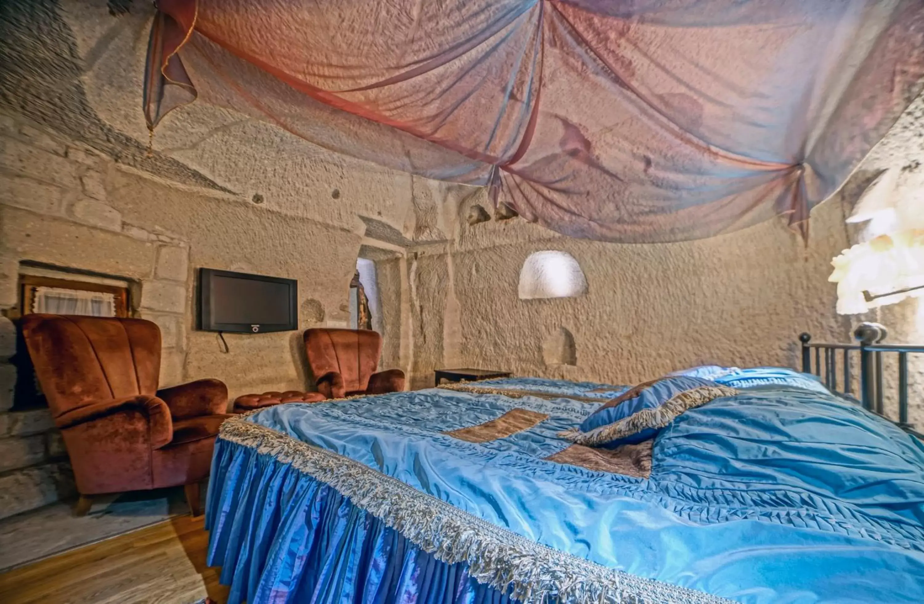 Bed in Anatolian Houses Cave Hotel & SPA