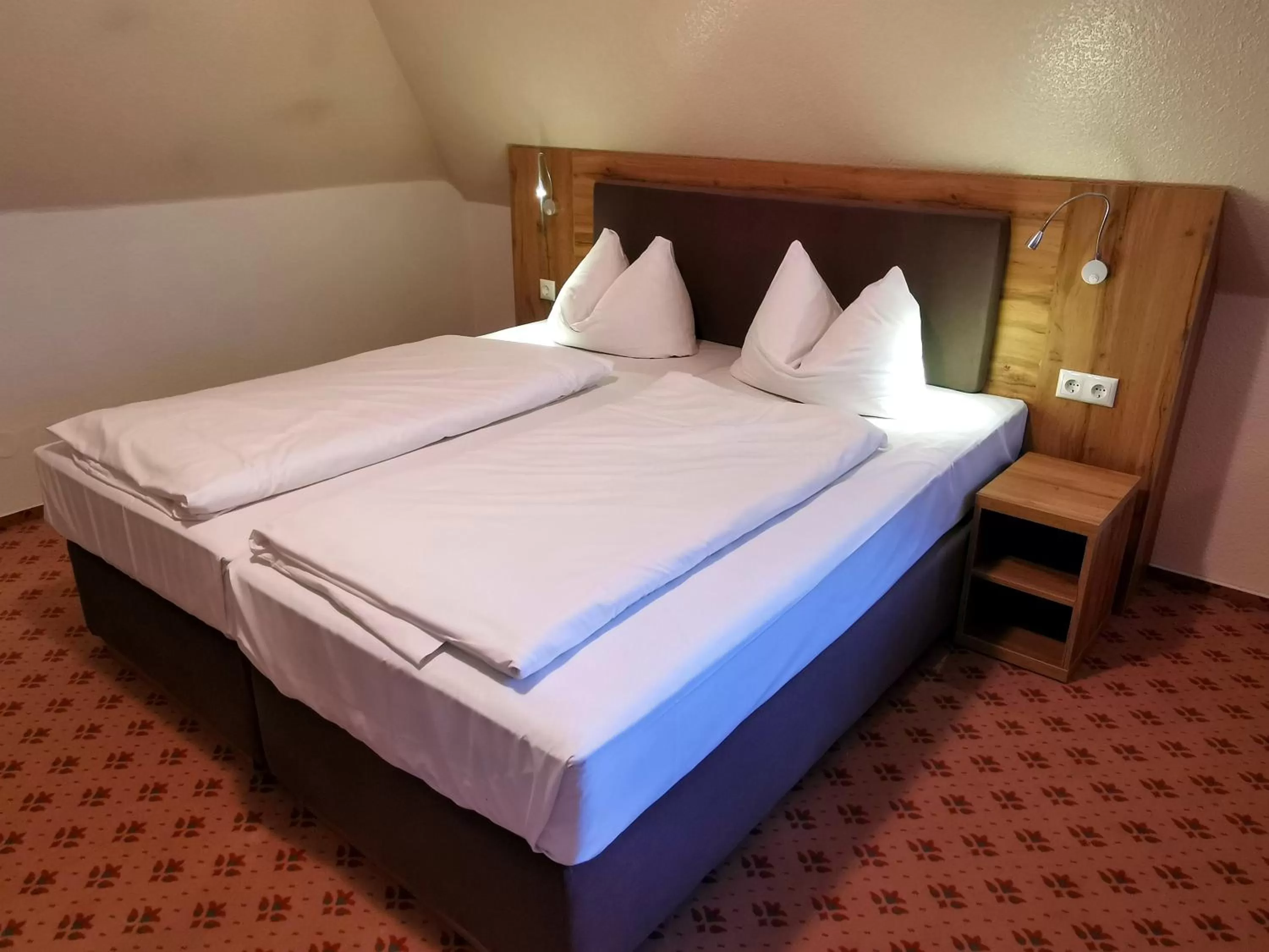 Photo of the whole room, Bed in Heidehotel Soltauer Hof