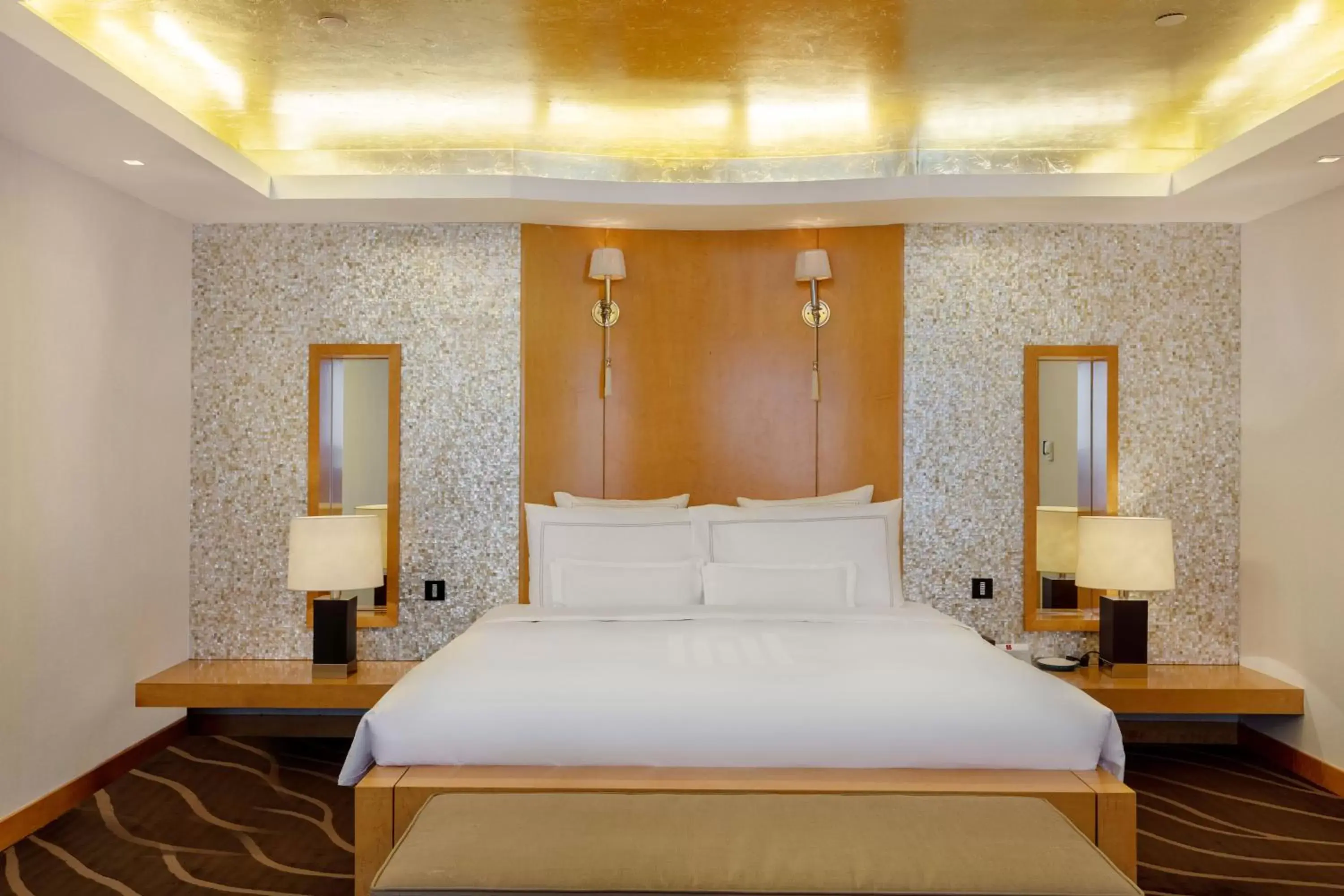 Bed in Grand Millennium Beijing