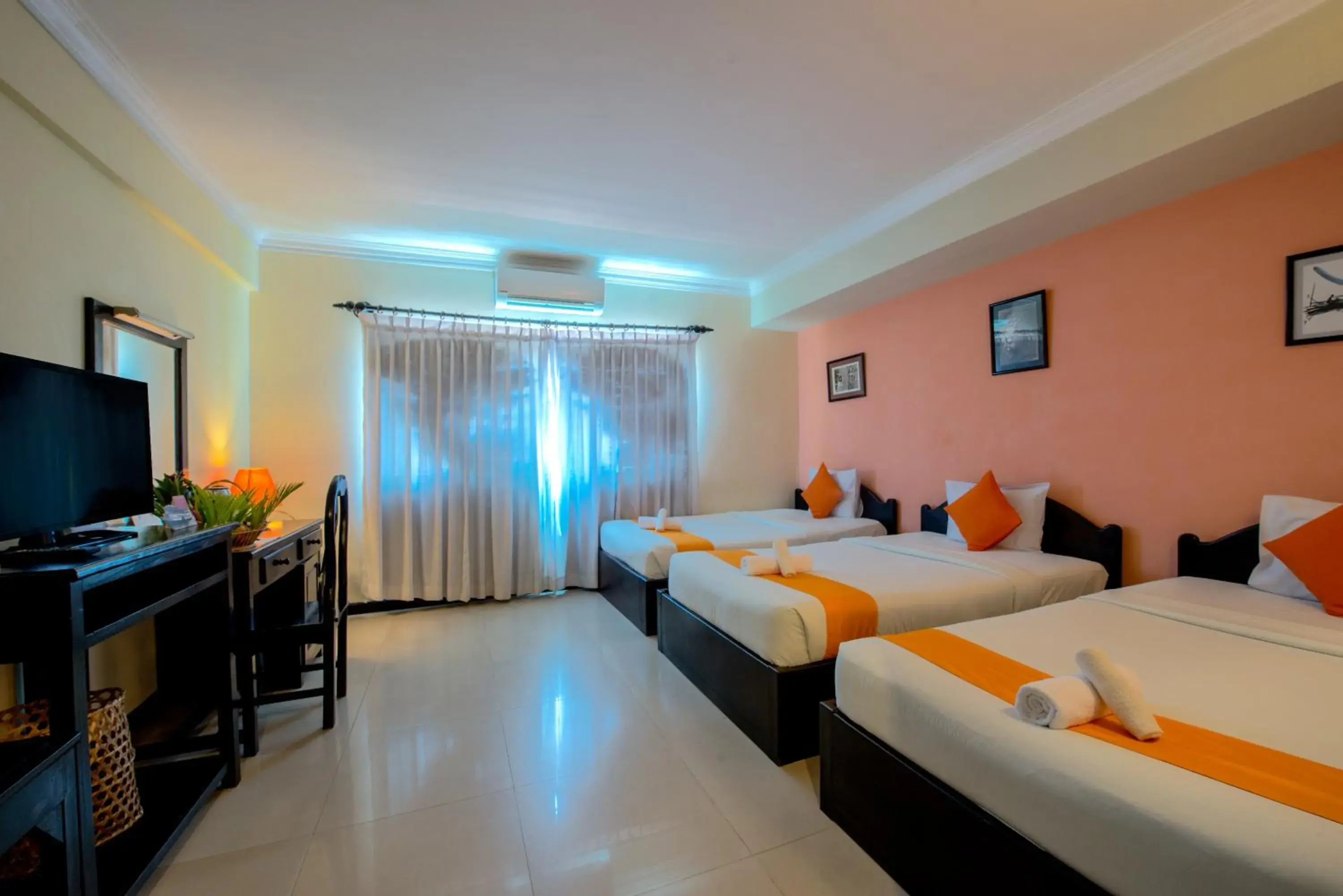 Photo of the whole room, TV/Entertainment Center in Angkor Panoramic Boutique Hotel