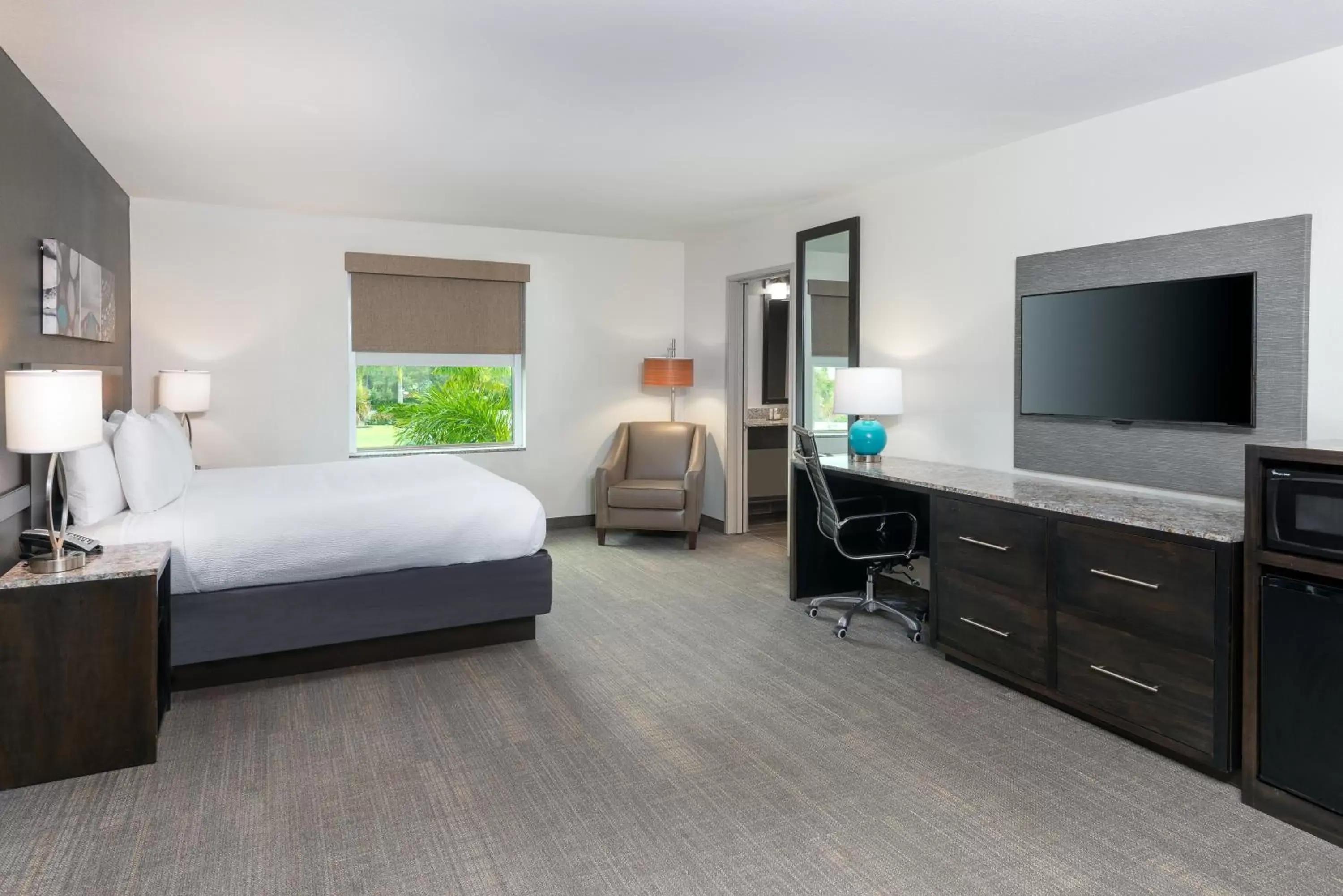 Bed, TV/Entertainment Center in Magnolia Pointe; BW Signature Collection