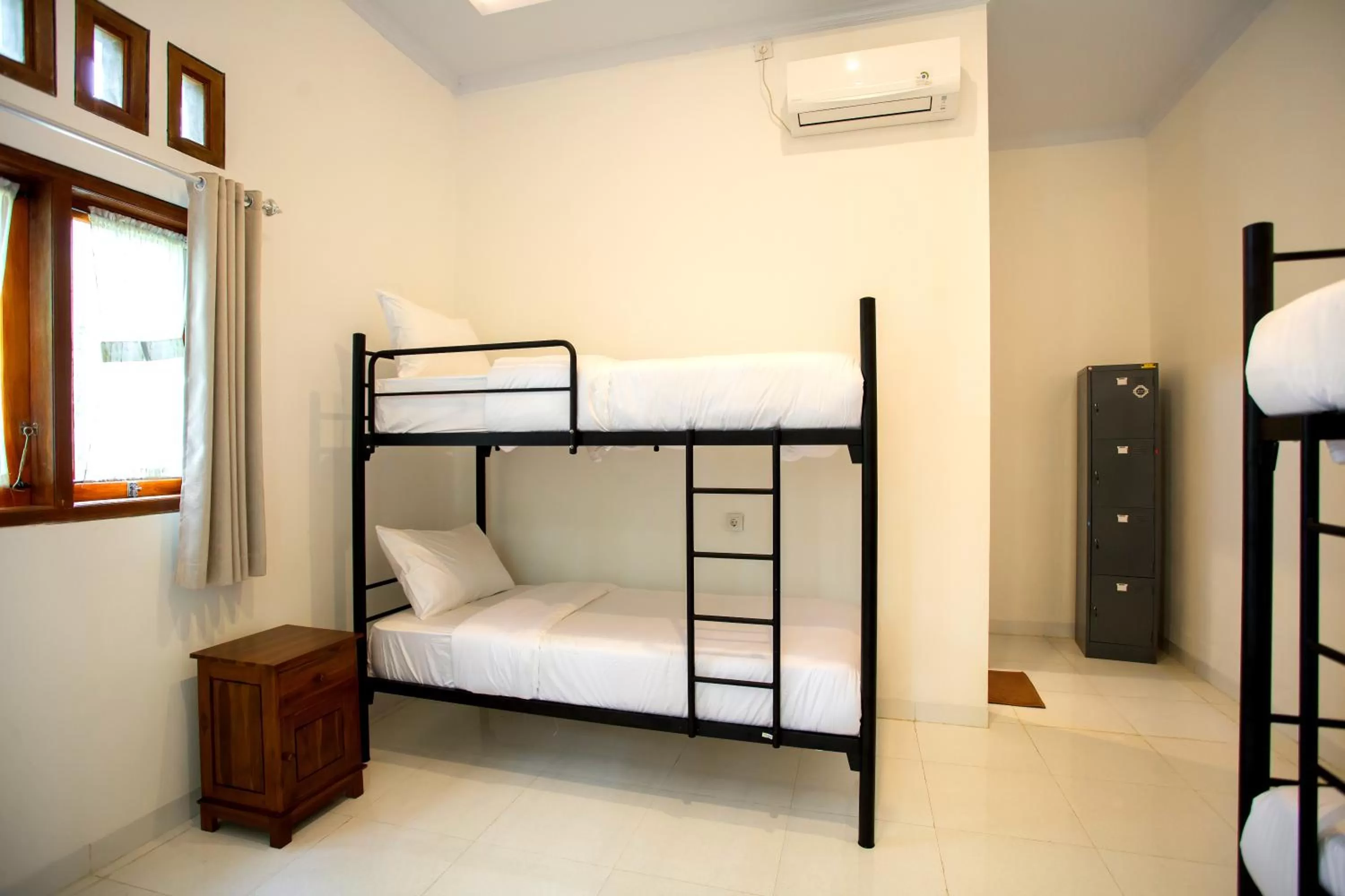 Bed in The Puncak Santhi Inn