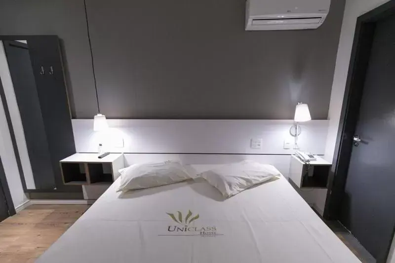 Bed in Uniclass Hotel Pinheiros