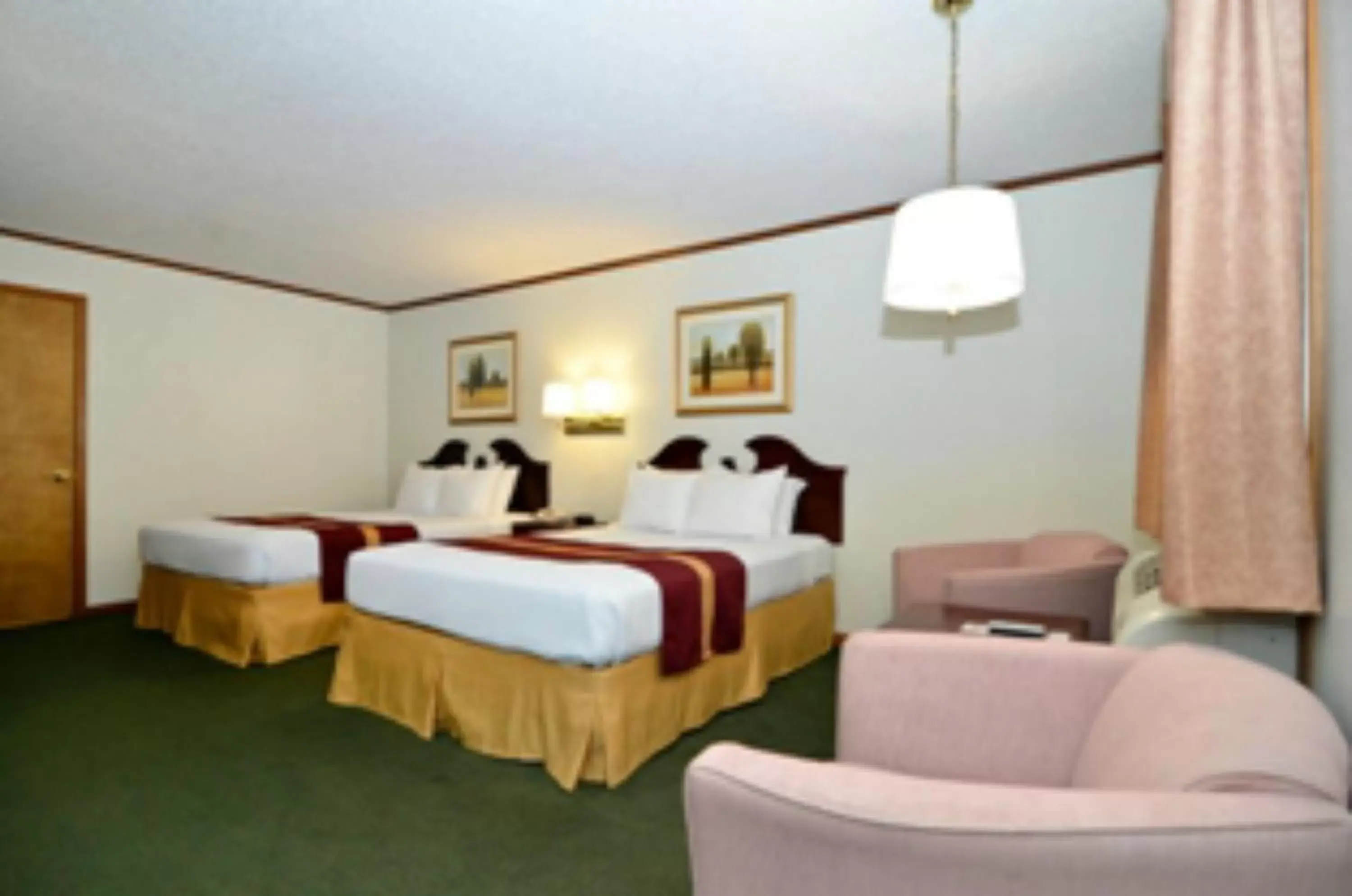 Bed in SureStay Hotel by Best Western Cameron