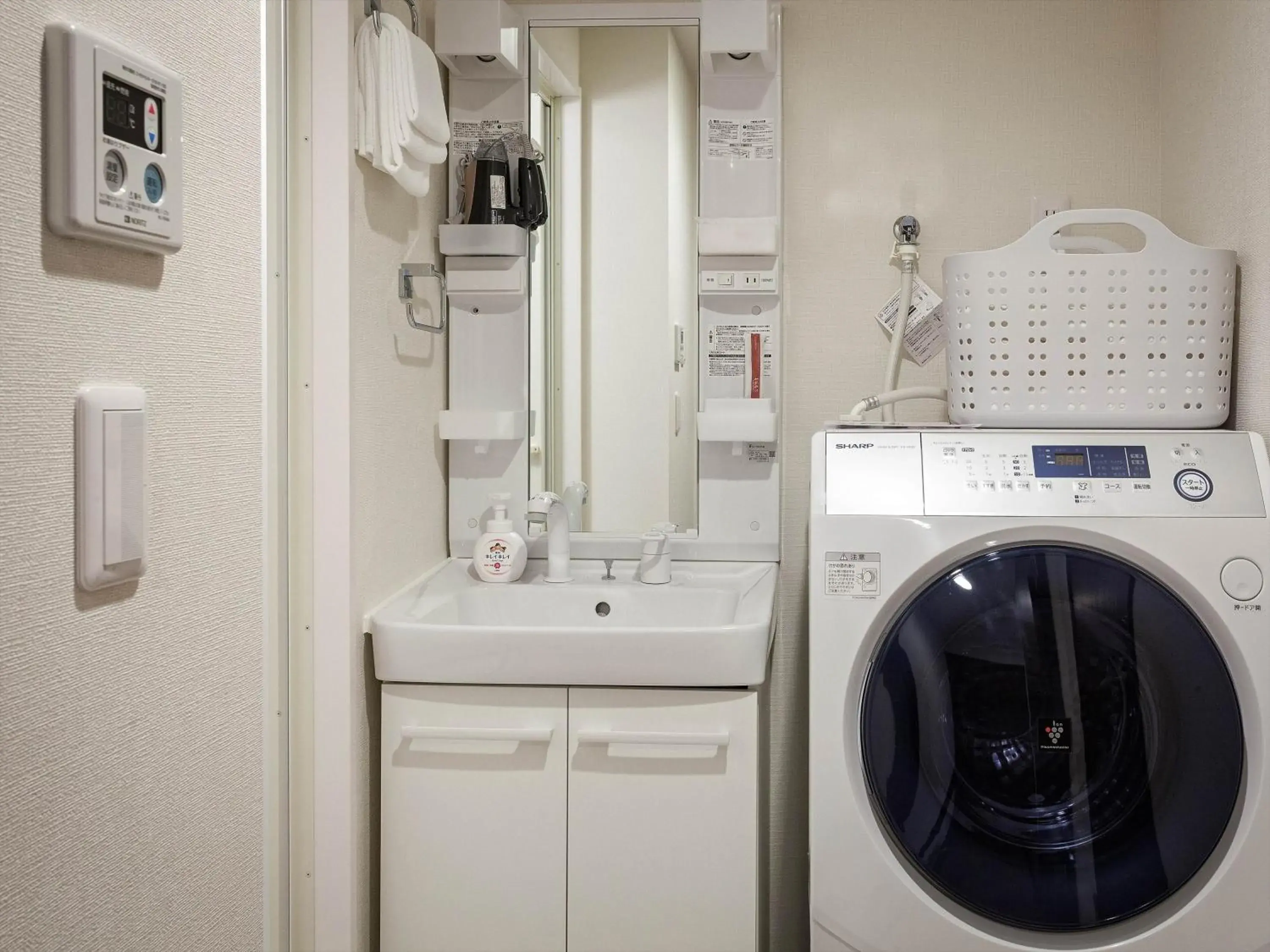 Bathroom in Kariyushi COndominium Resort Naha Living Inn Asahibashiekimae Annex and Premier